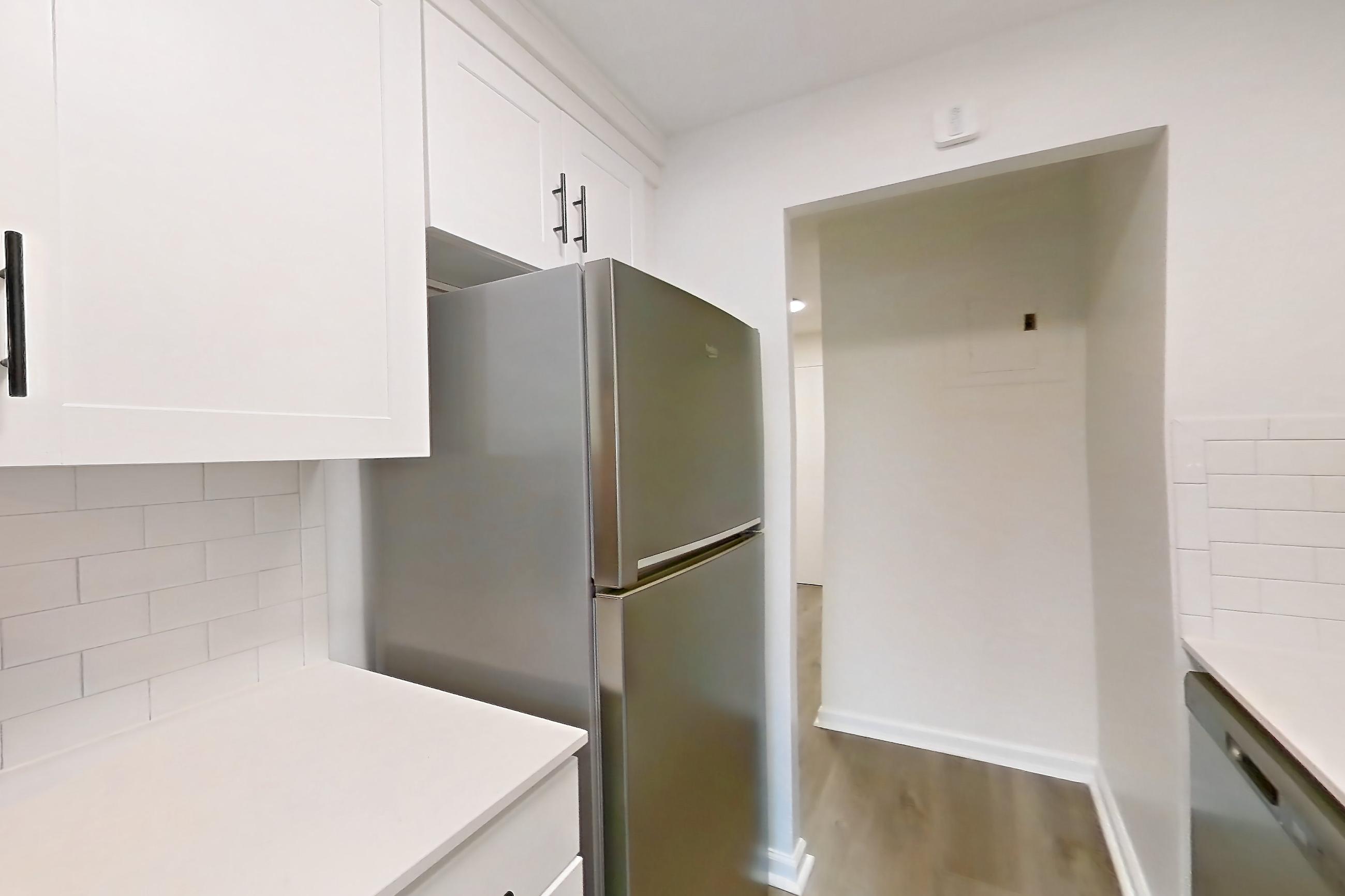 Kitchen in Apartment 30-08b at Waterside Plaza, 1H floor plan