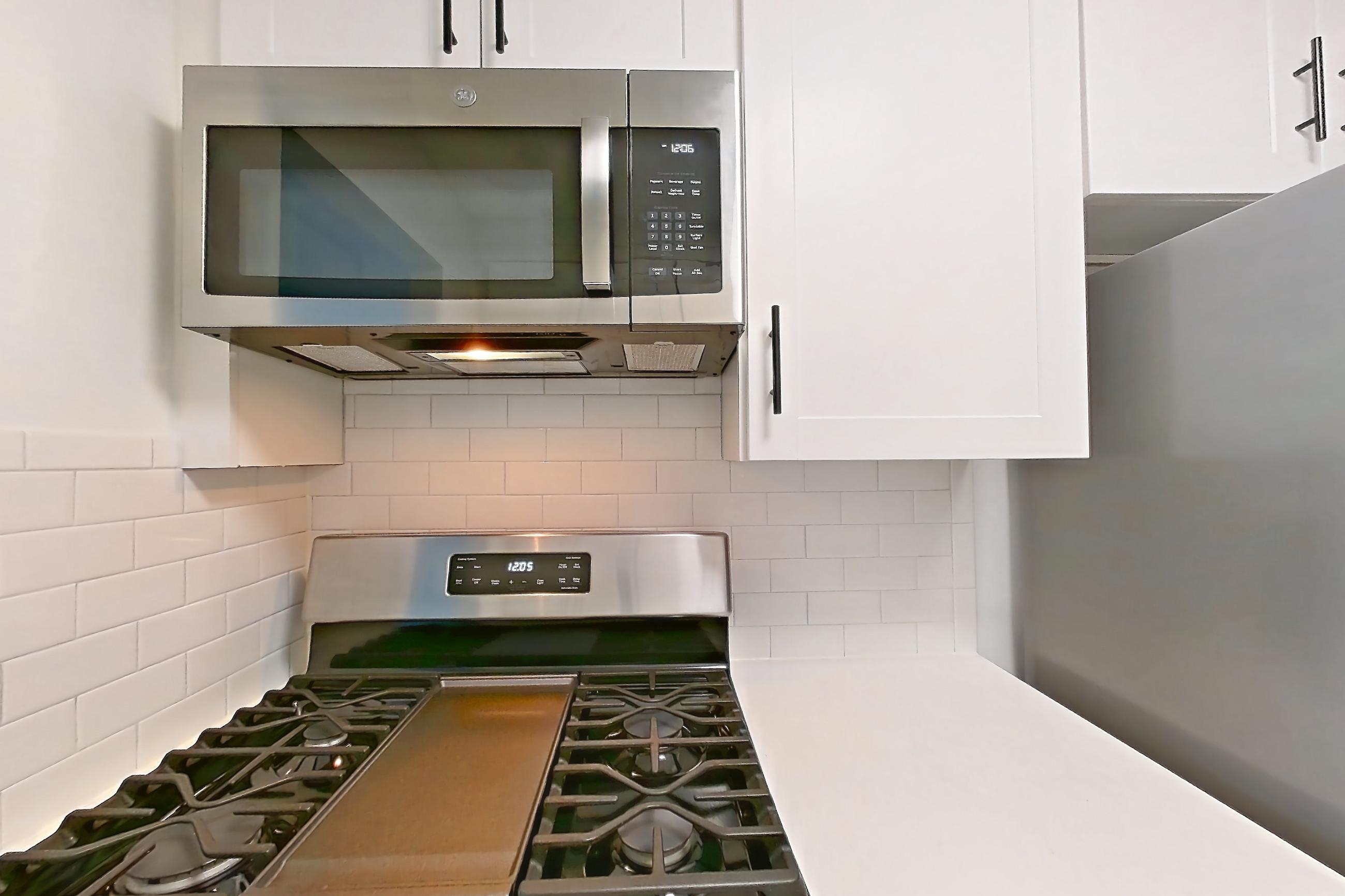 Kitchen in Apartment 30-08b at Waterside Plaza, 1H floor plan