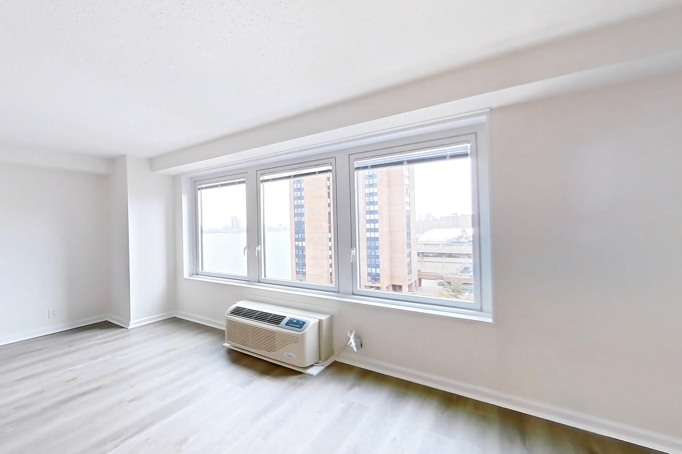 Living space in Apartment 30-08b at Waterside Plaza, 1H floor plan