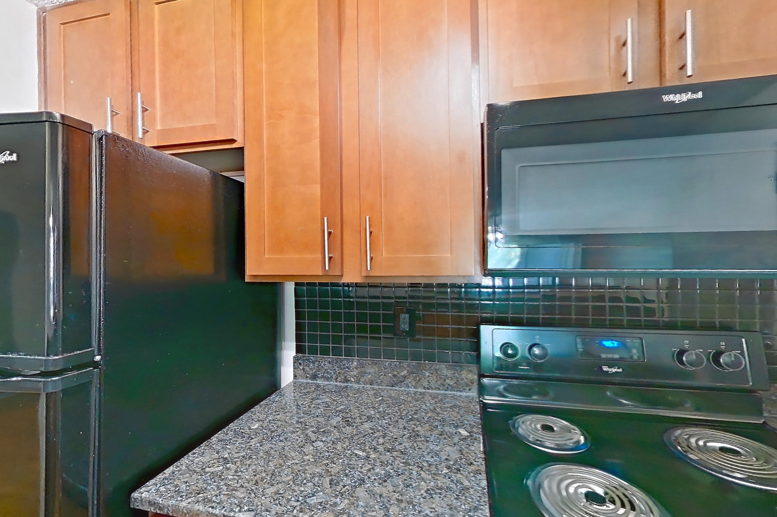 Kitchen in Apartment 4212 at Cortland 3131, B1R - Woodruff floor plan