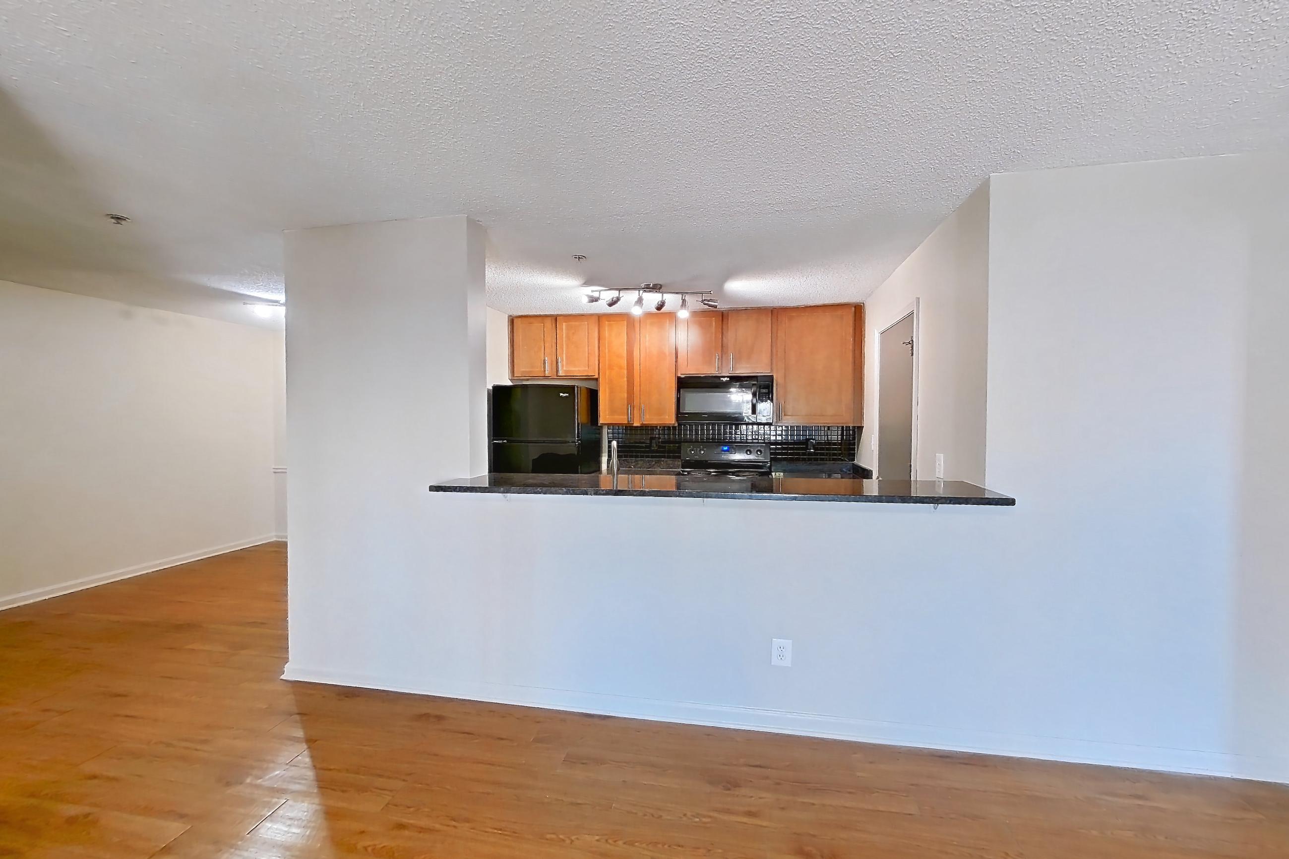 Living room in Apartment 4212 at Cortland 3131, B1R - Woodruff floor plan