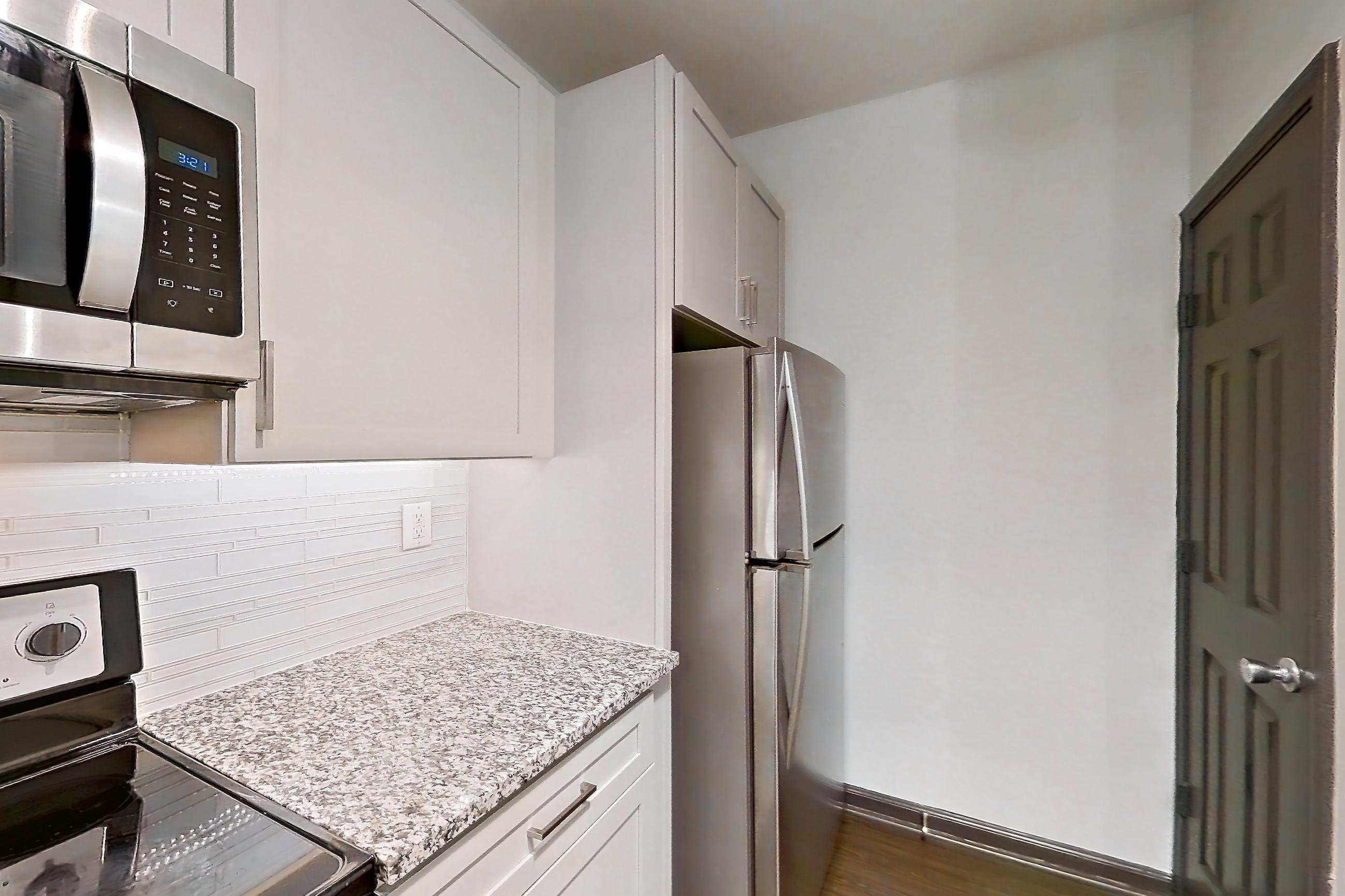 Kitchen in Apartment 1919 at Cortland Duluth, B2R - Crest E floor plan
