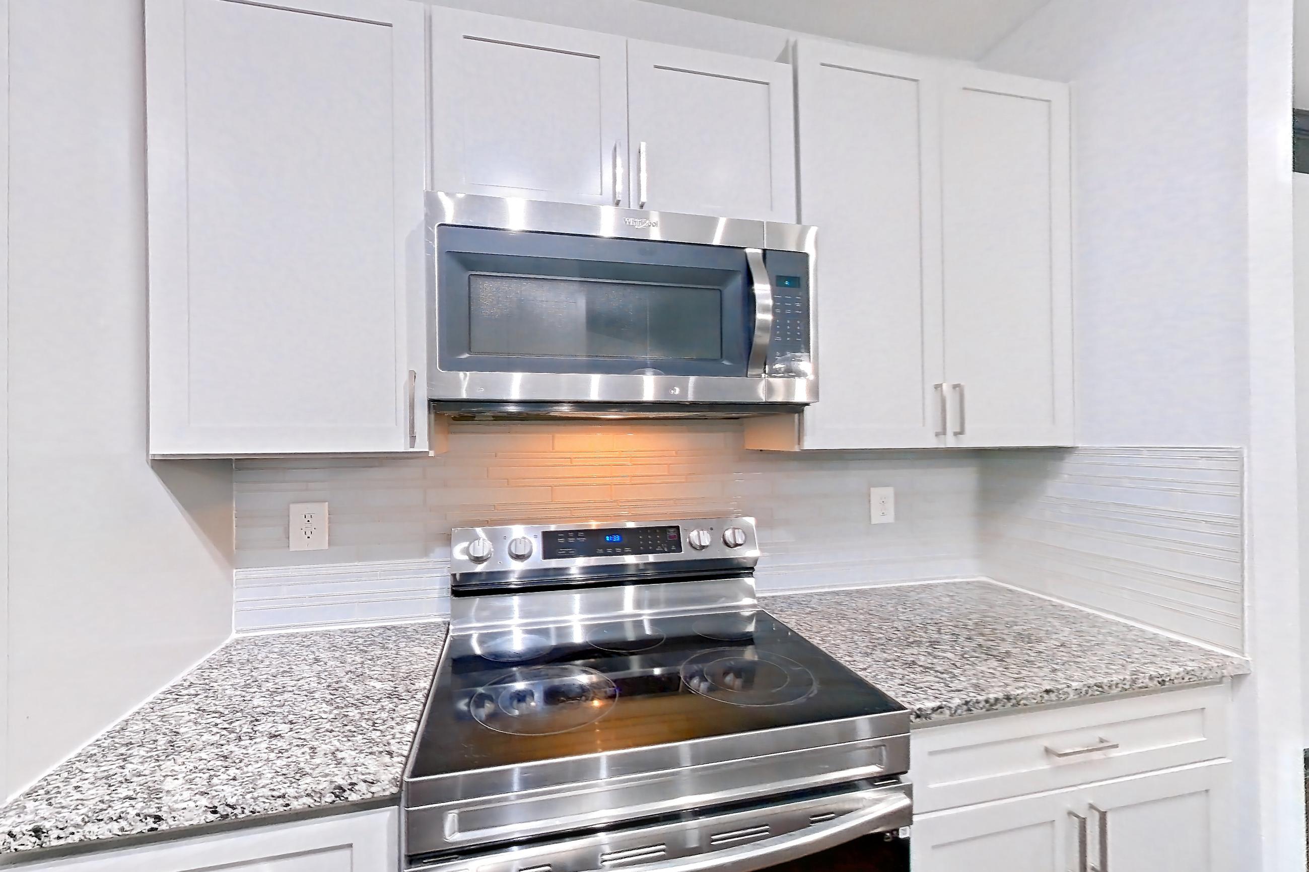 Kitchen in Apartment 2113 at Cortland Duluth, B6R - Opera E floor plan