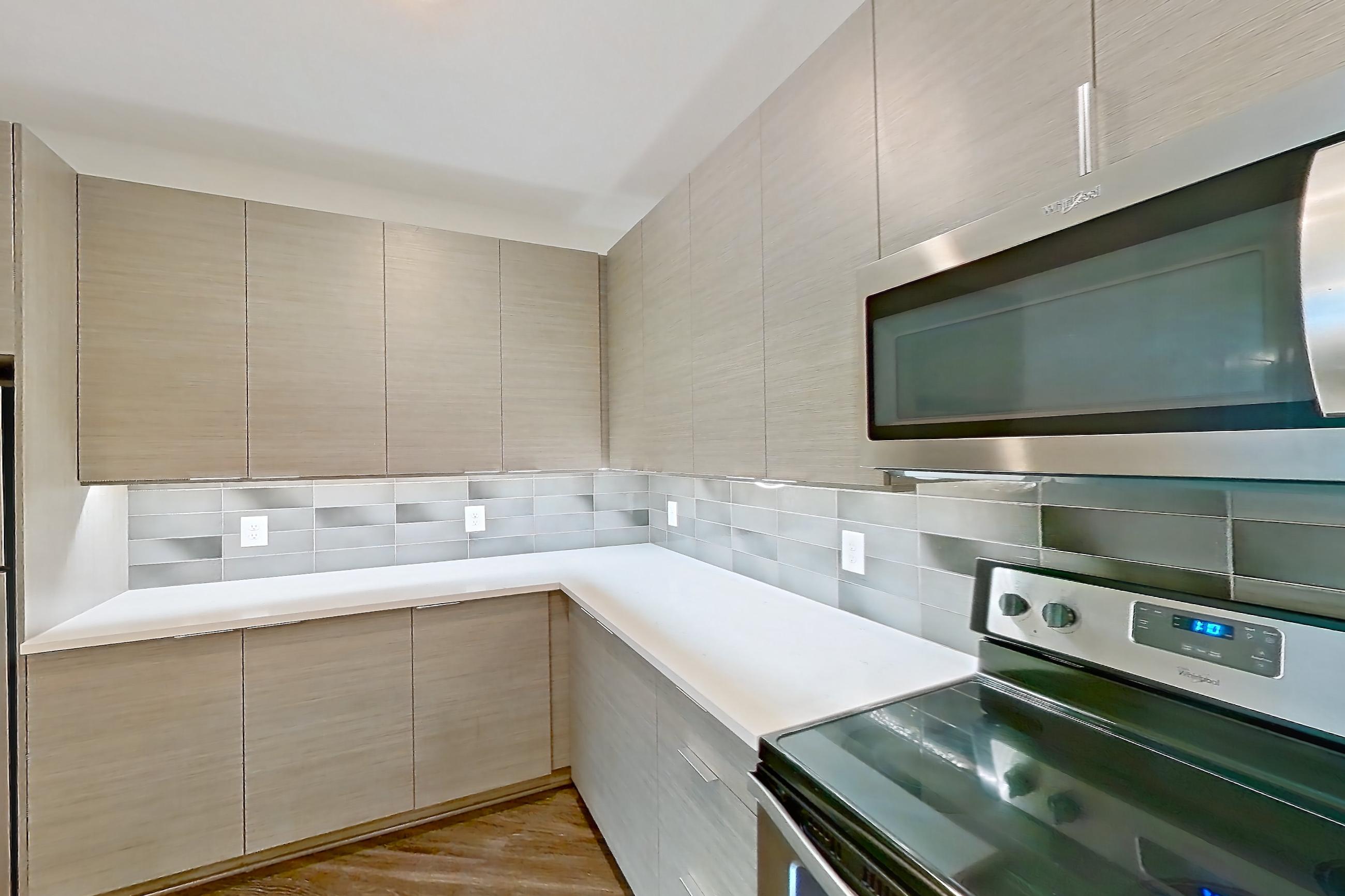 Kitchen in Apartment 404 at Cortland at the Battery, B11-The Cooperstown-1st Base floor plan