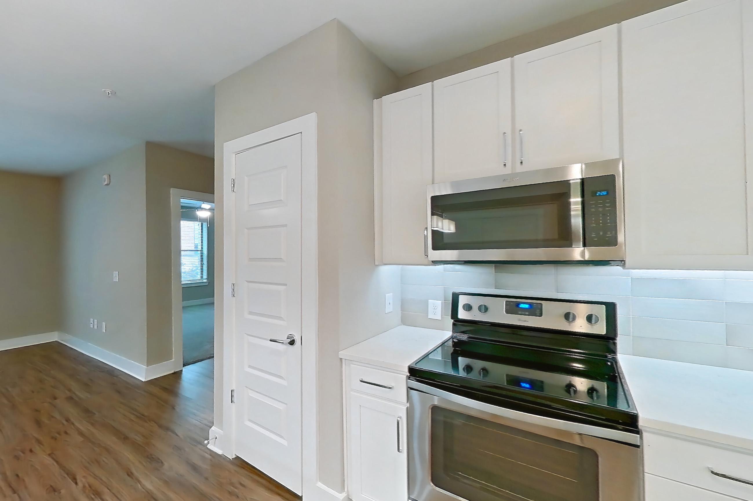 Kitchen in Apartment 307 at Cortland at the Battery, B16-The Milwaukee-2nd Base floor plan