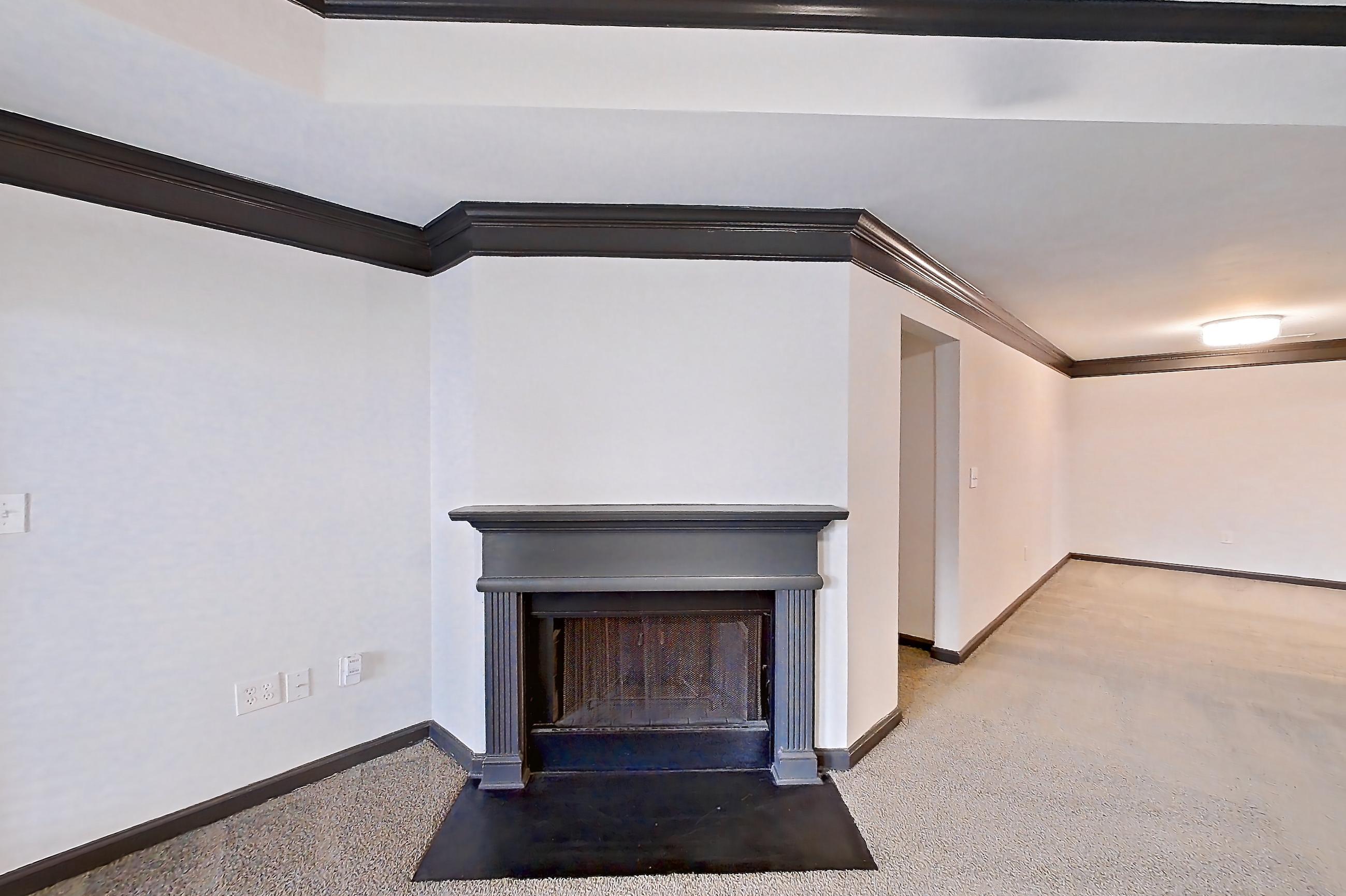 Living room with fireplace, Apartment 2924 at Cortland Duluth