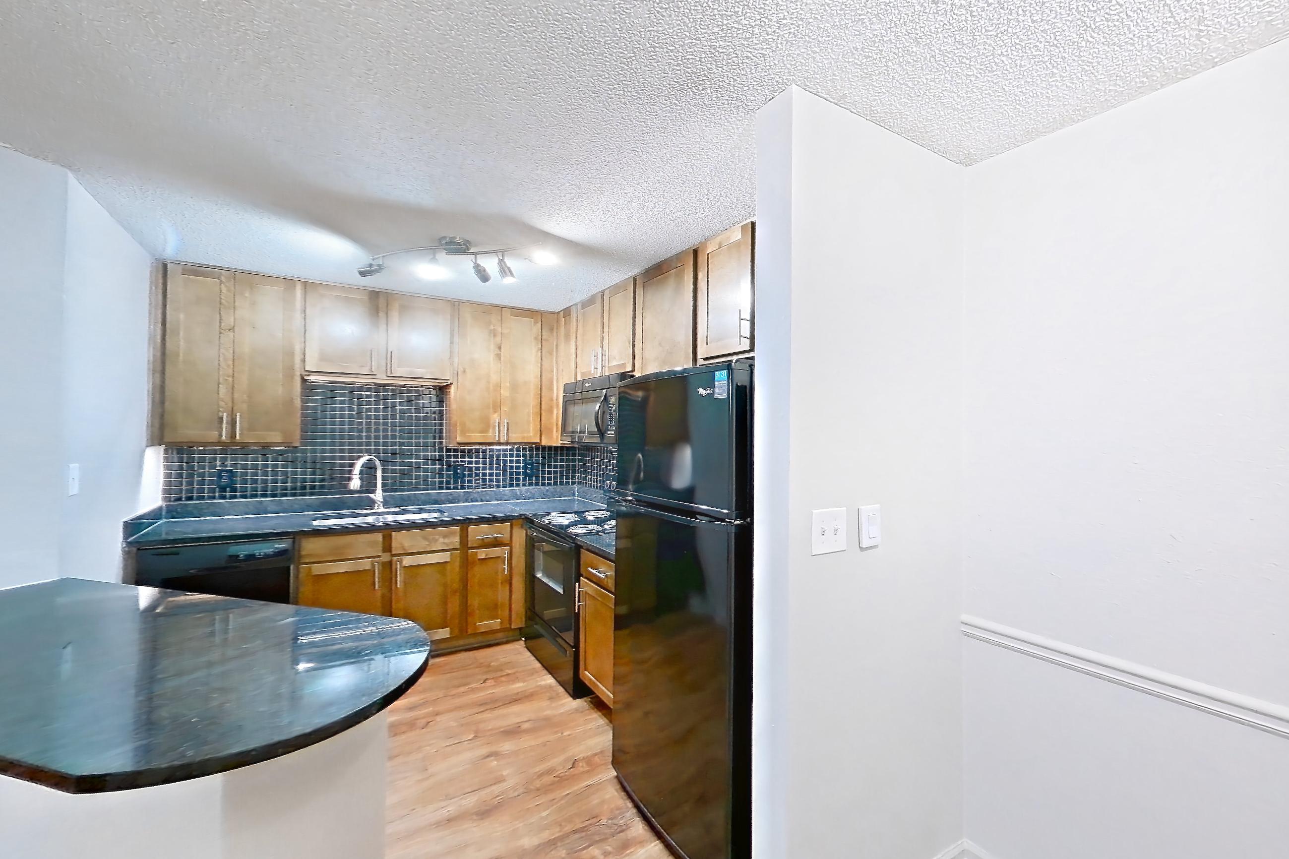 Dining room in Apartment 9004 at Cortland 3131, A2R - Oxford floor plan