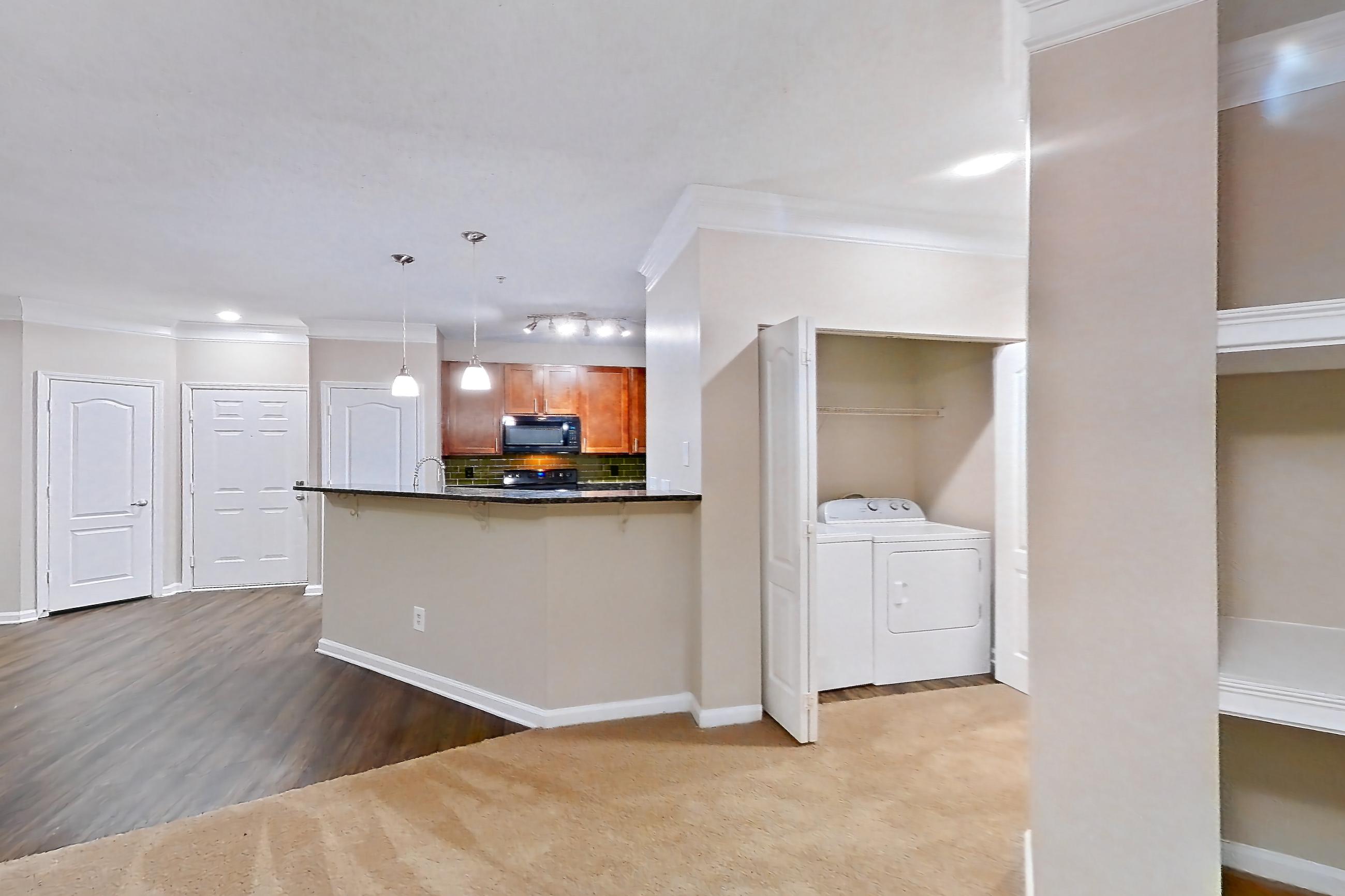 Living room in Apartment 0230 at Cortland Duluth, C1 - Executive W floor plan