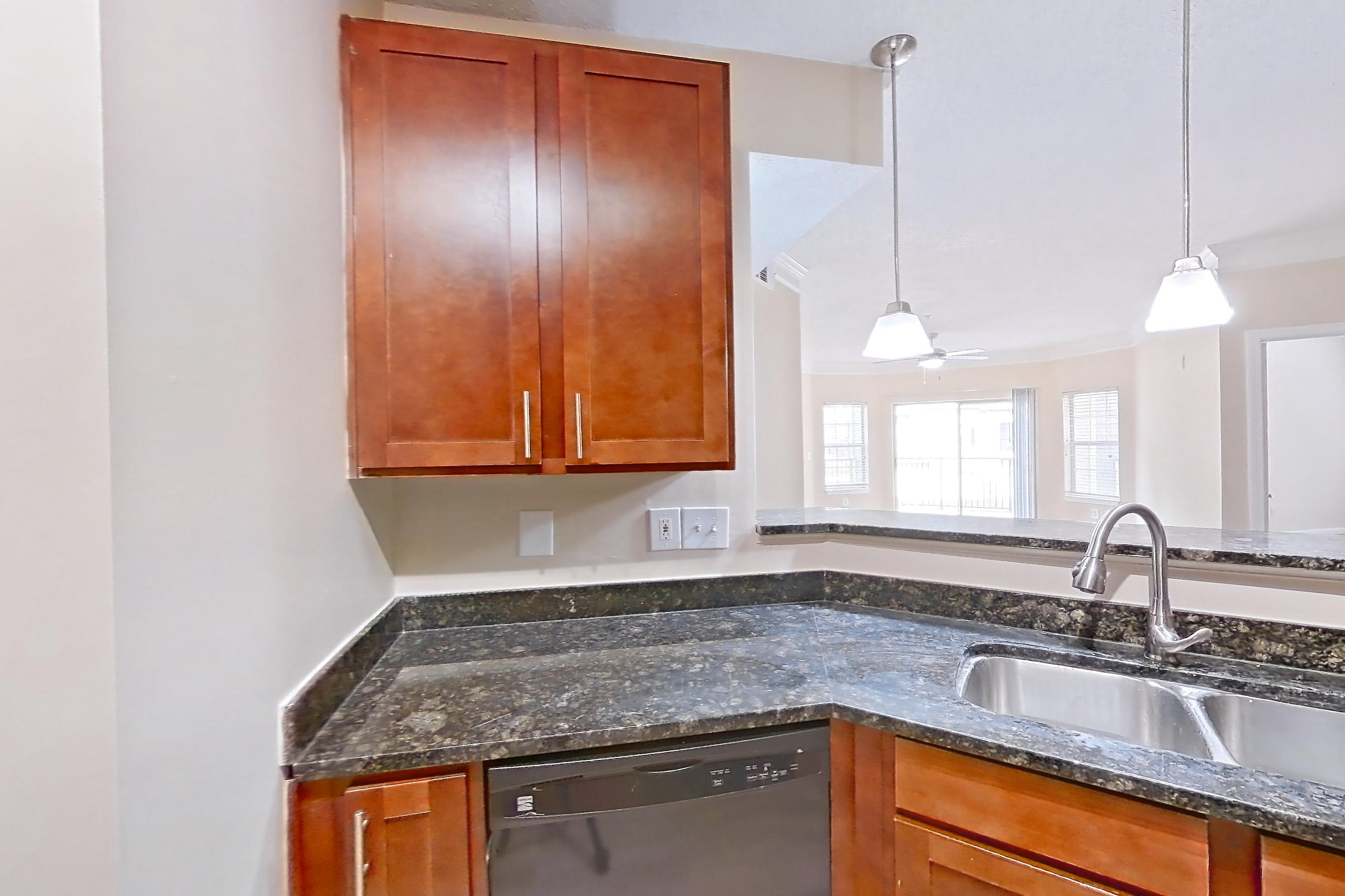 Kitchen in Apartment 0814 at Cortland Duluth, B5 - Symphony W floor plan