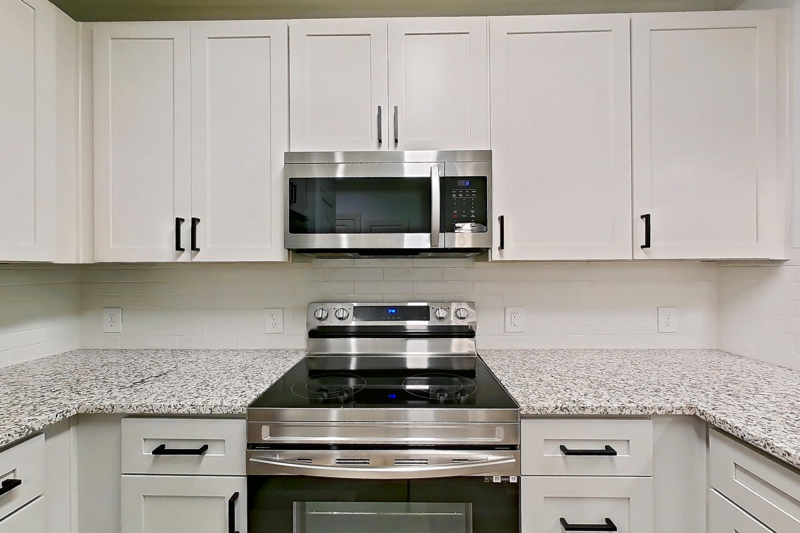 Kitchen in a A1R - Blackthorn floor plan apartment, representative of Apartment 1323 at Cortland Oleander