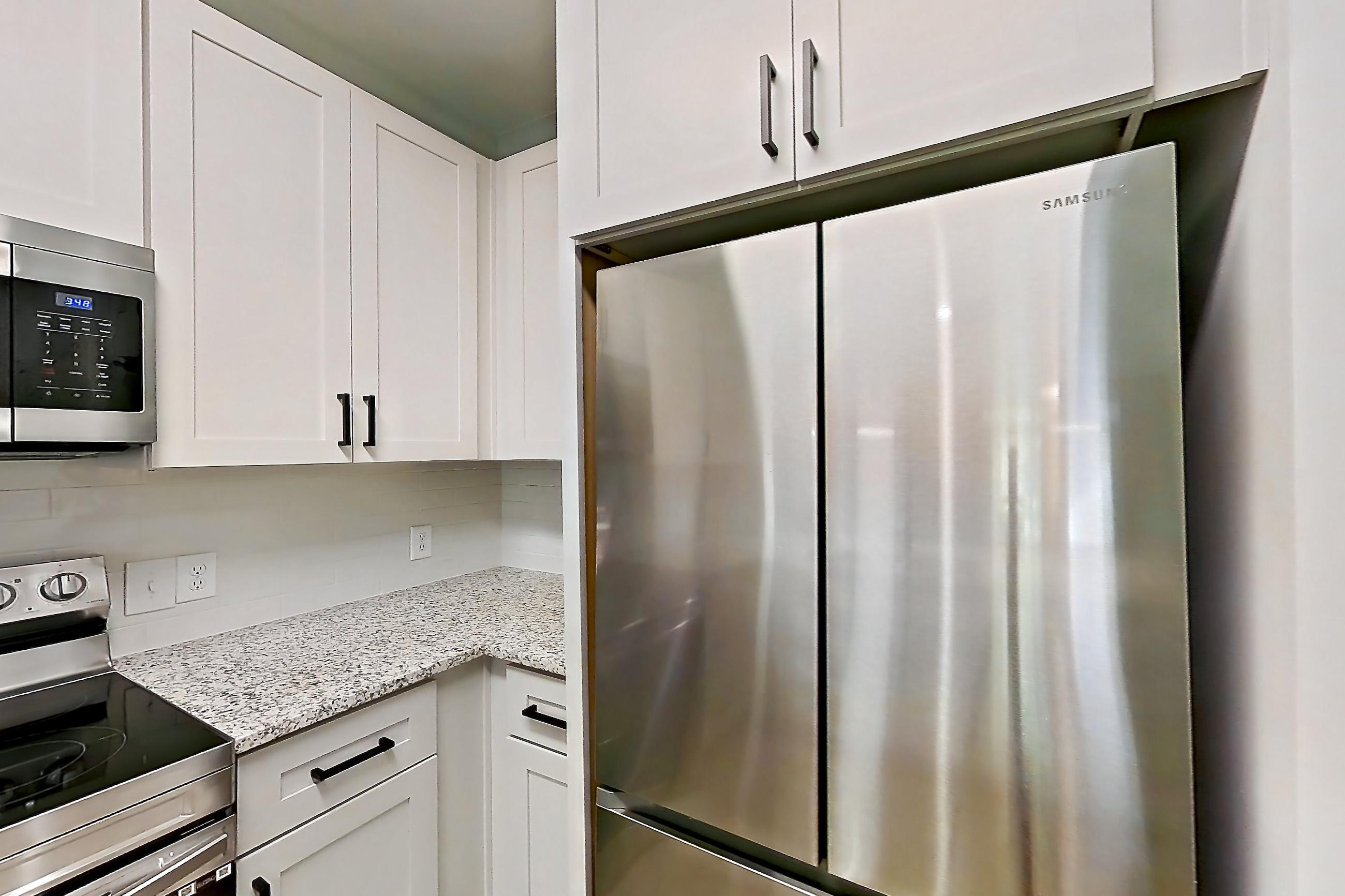 Kitchen in a A16R - Fuschia floor plan apartment, representative of Apartment 3213 at Cortland Oleander