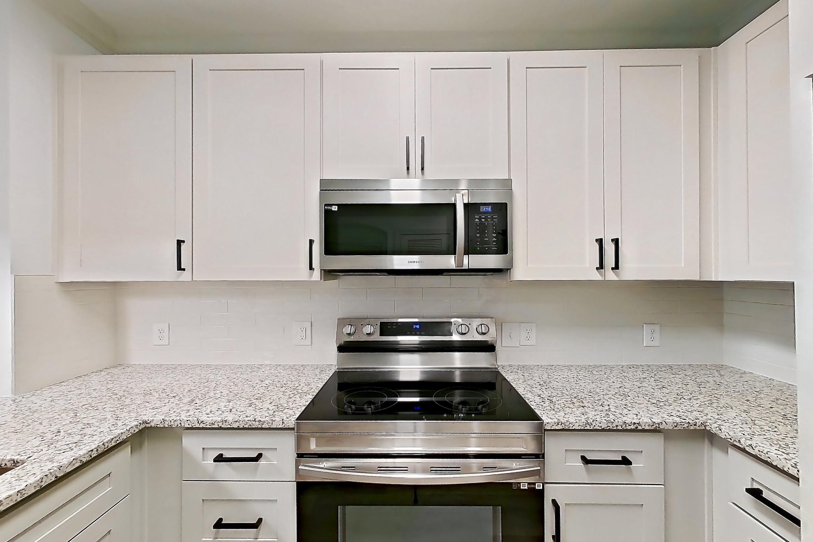 Kitchen in a A16R - Fuschia floor plan apartment, representative of Apartment 3213 at Cortland Oleander