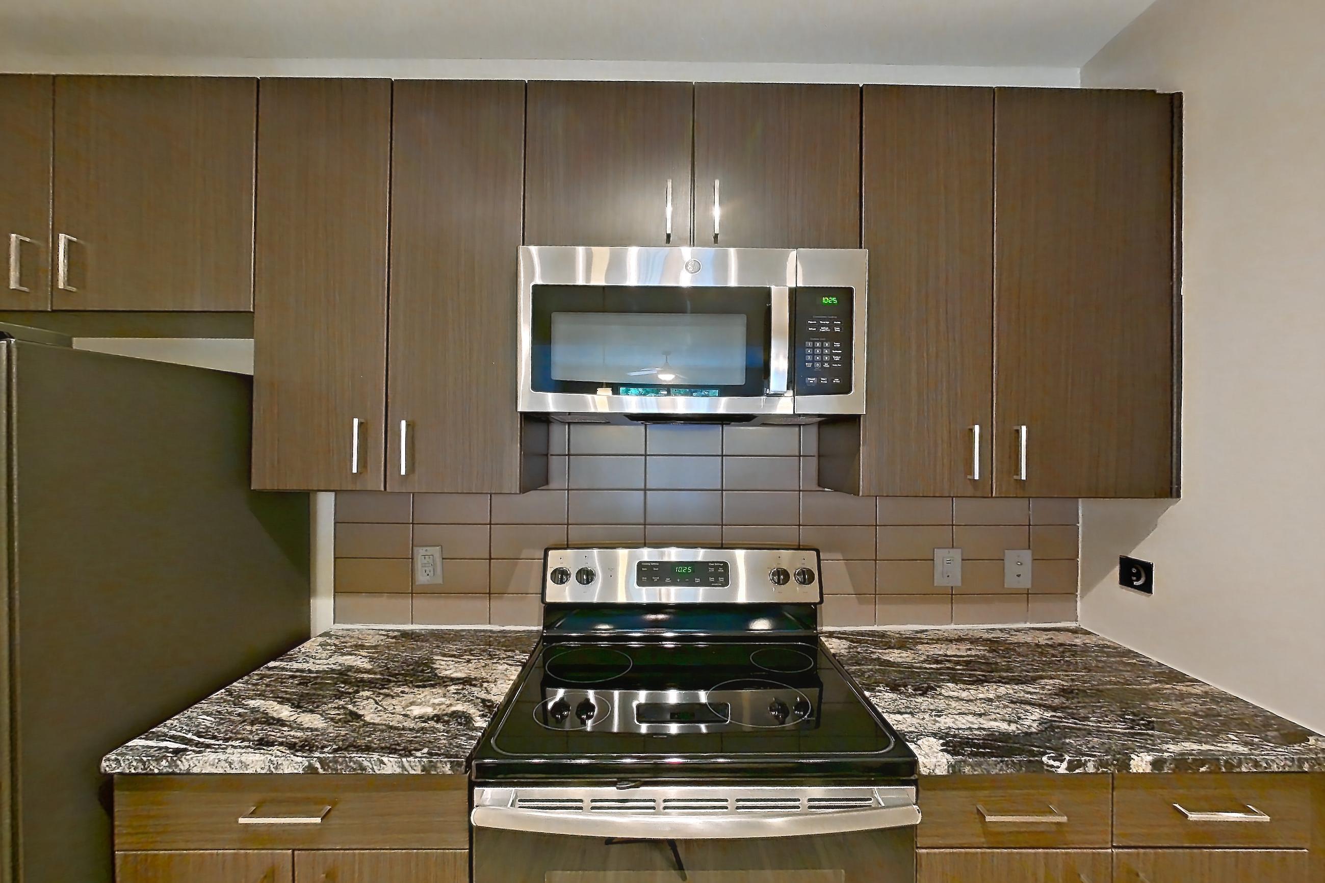 Kitchen in a B9 - Eton floor plan apartment, representative of Apartment 6101 at Cortland Wren Northlake