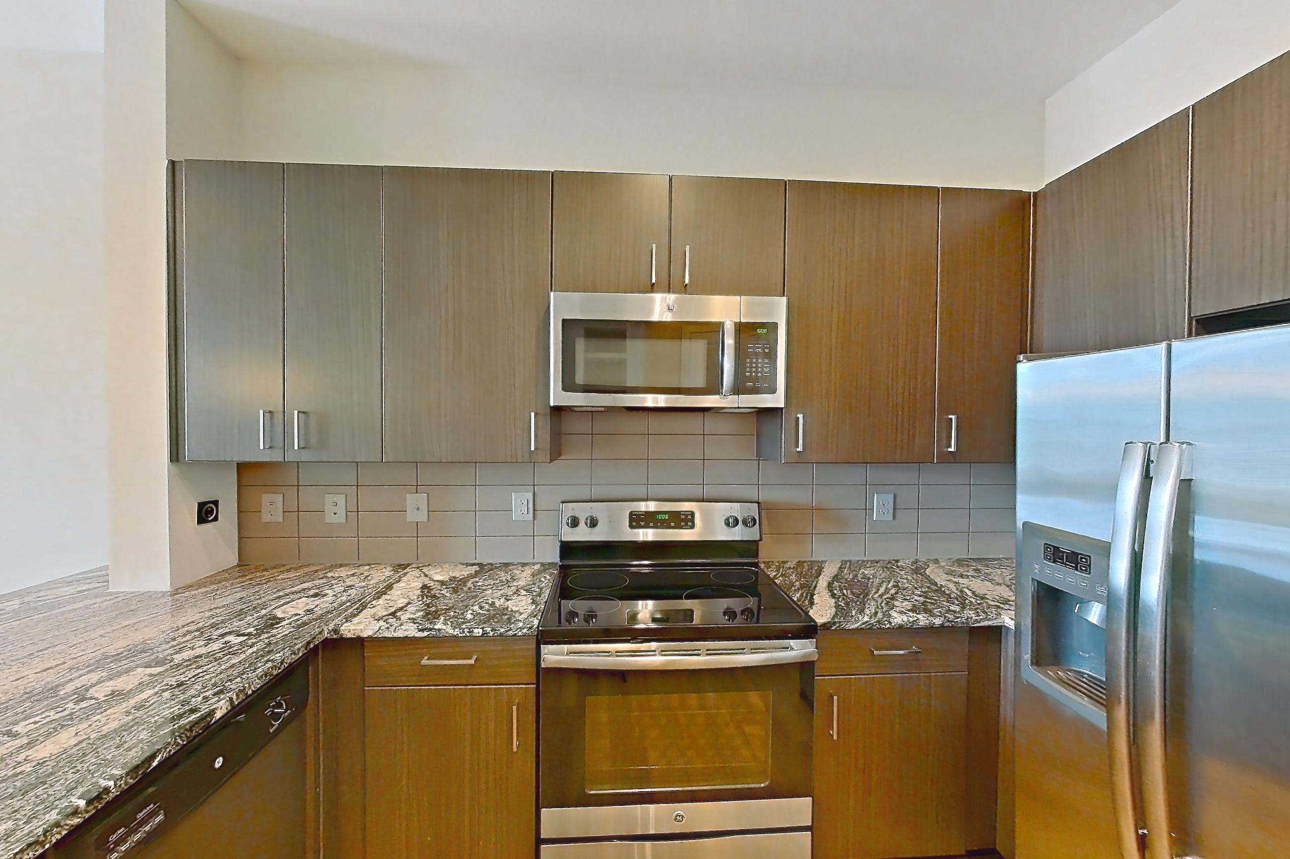Kitchen in a A9 - Chelsea floor plan apartment, representative of Apartment 11103 at Cortland Wren Northlake