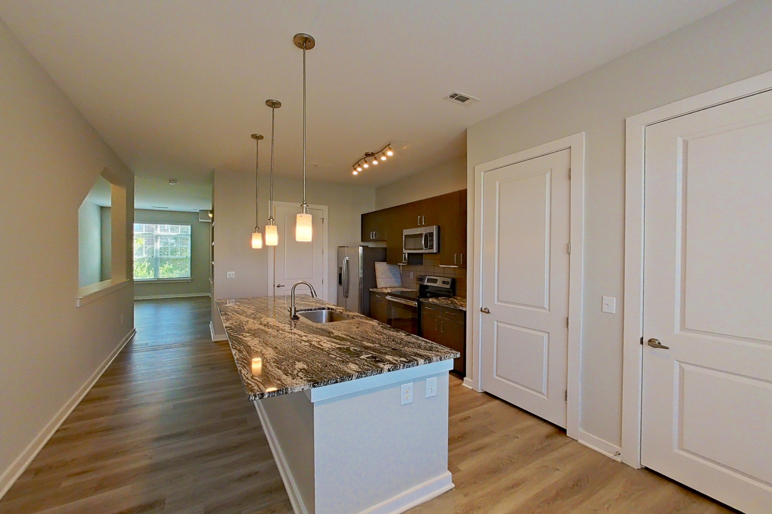 Dining room in a B17 - Seafoam floor plan apartment, representative of Apartment 3104 at Cortland Wren Northlake