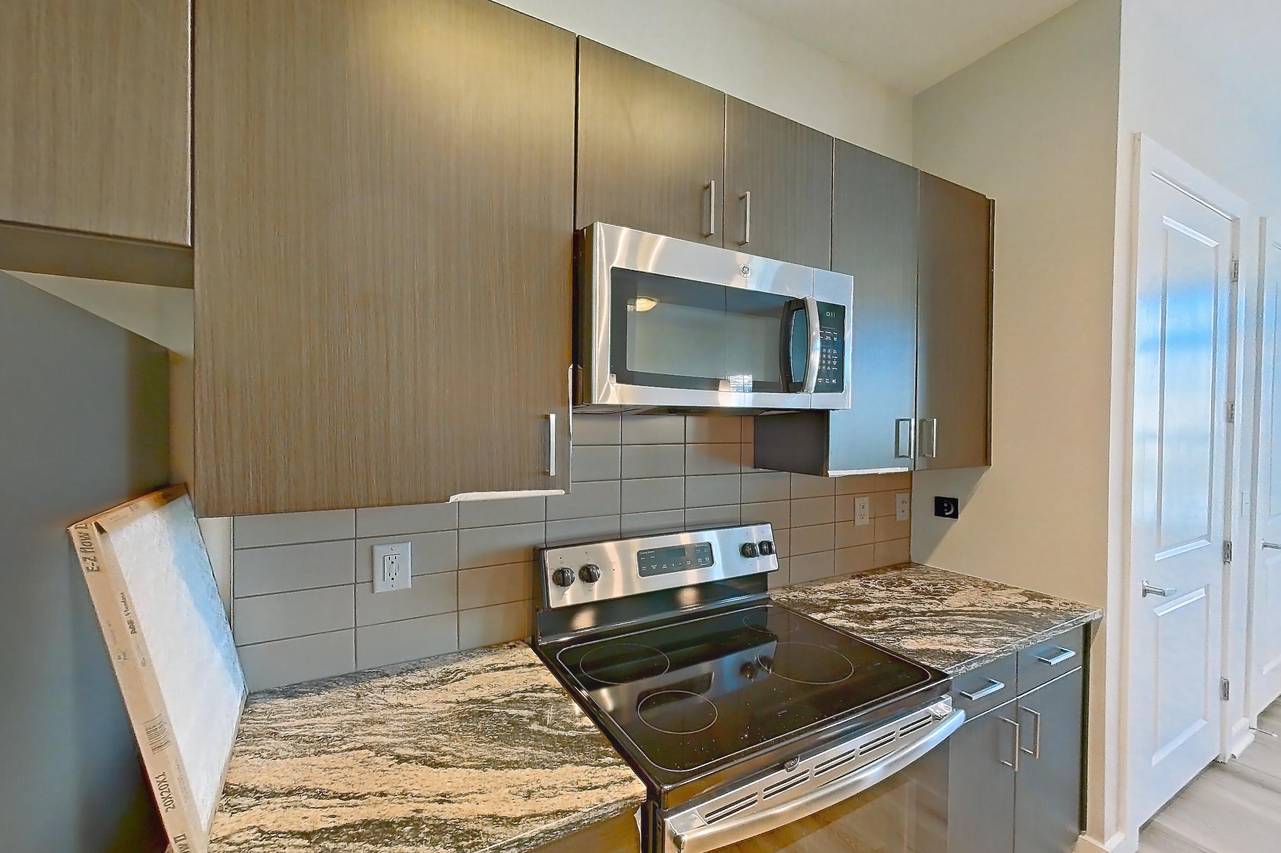Kitchen in a B17 - Seafoam floor plan apartment, representative of Apartment 3104 at Cortland Wren Northlake