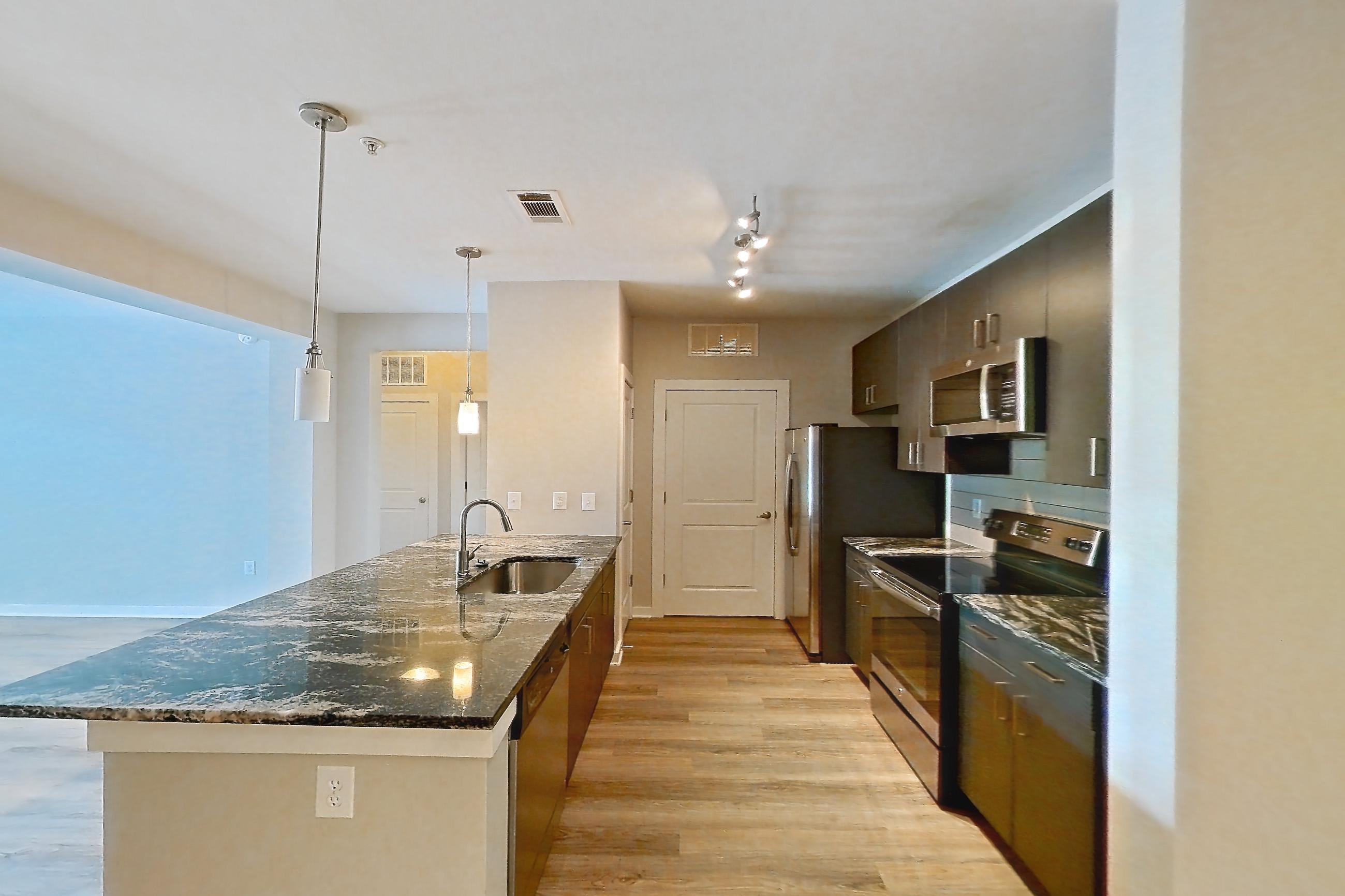 Dining room in a B4 - Eton floor plan apartment, representative of Apartment 6303 at Cortland Wren Northlake