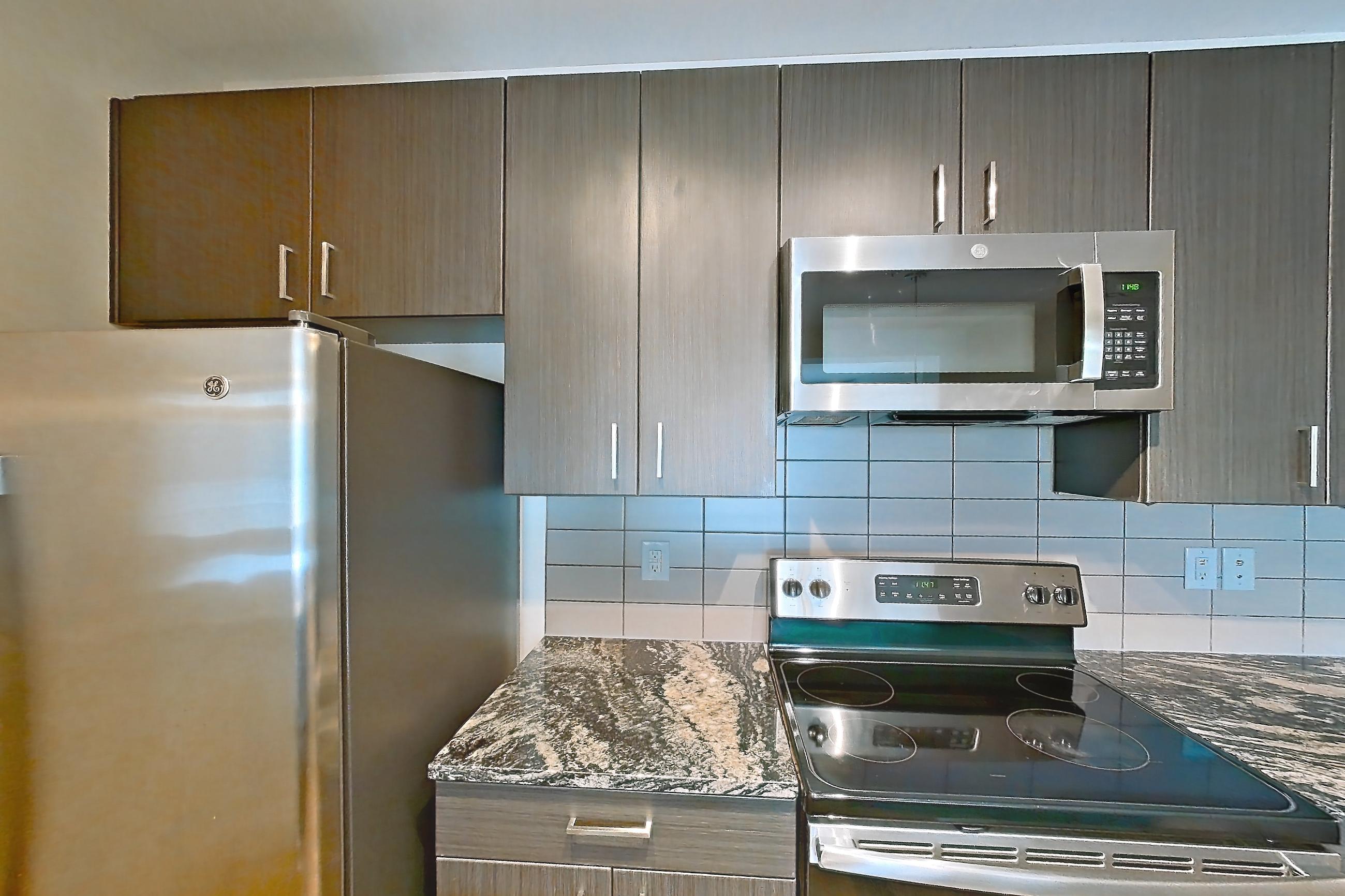 Kitchen in a B4 - Eton floor plan apartment, representative of Apartment 6303 at Cortland Wren Northlake