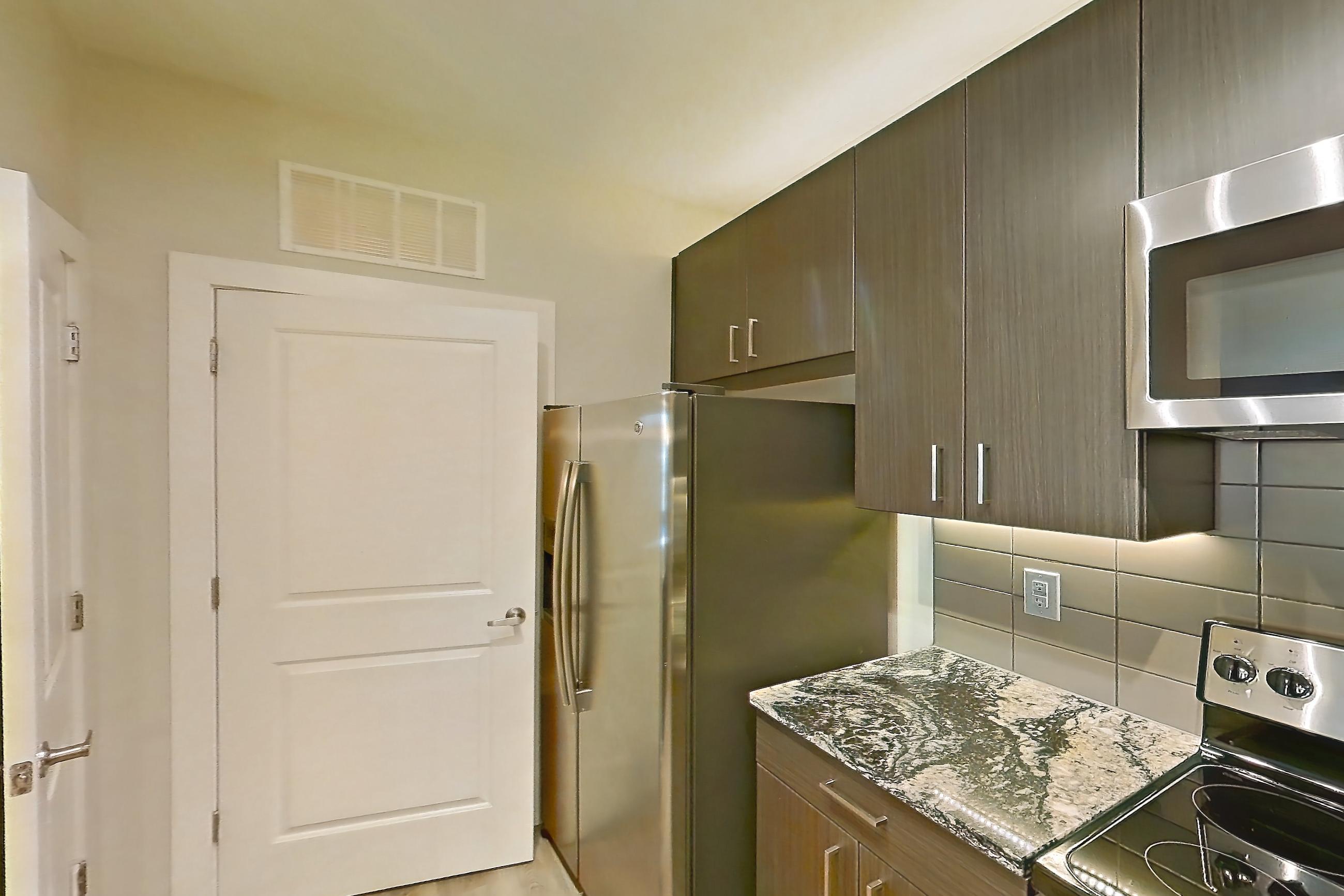 Kitchen in a B16 - Sapphire floor plan apartment, representative of Apartment 6202 at Cortland Wren Northlake