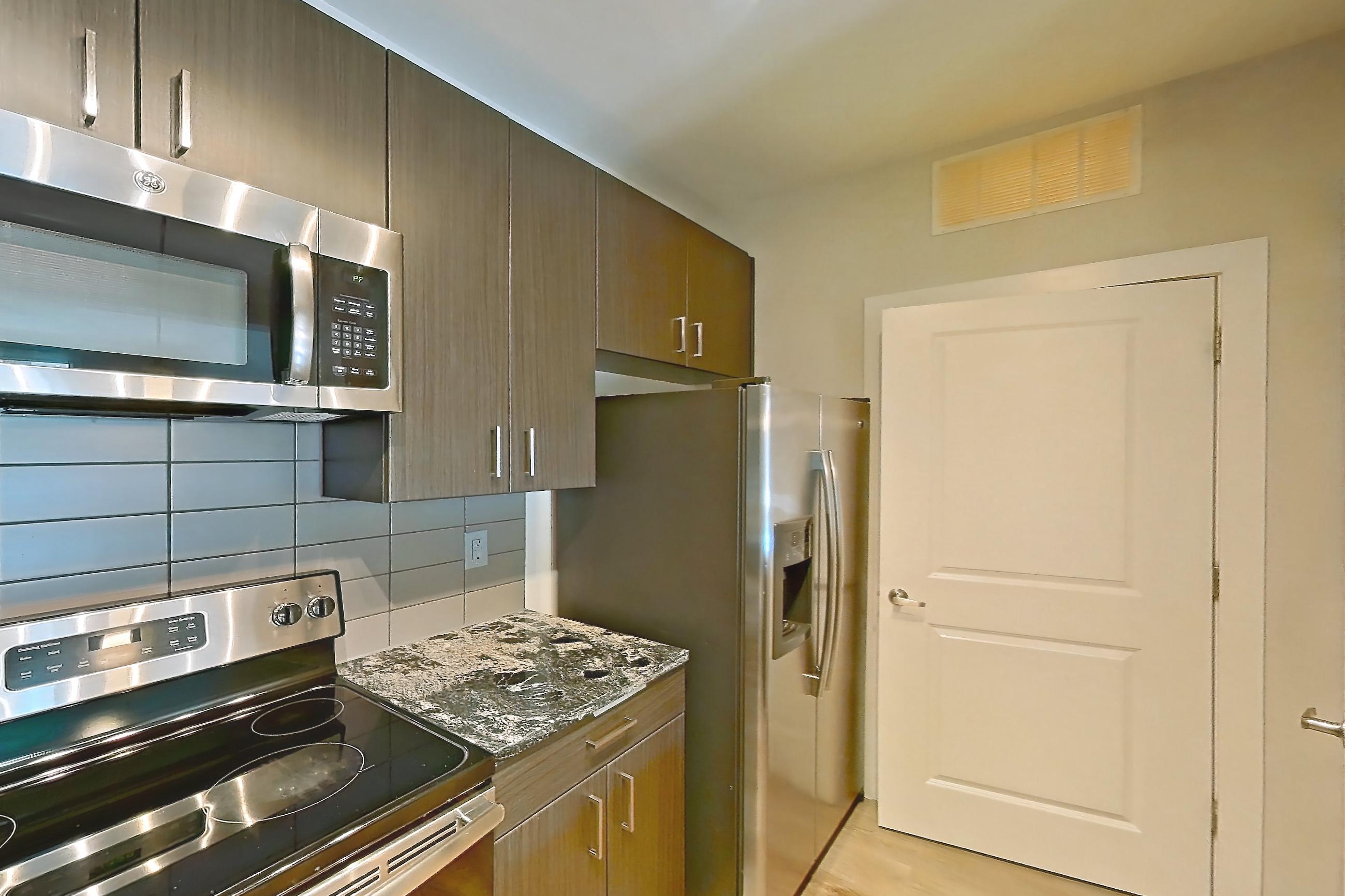 Kitchen in Apartment 9201 at Cortland Wren Northlake, B9 - Eton floor plan