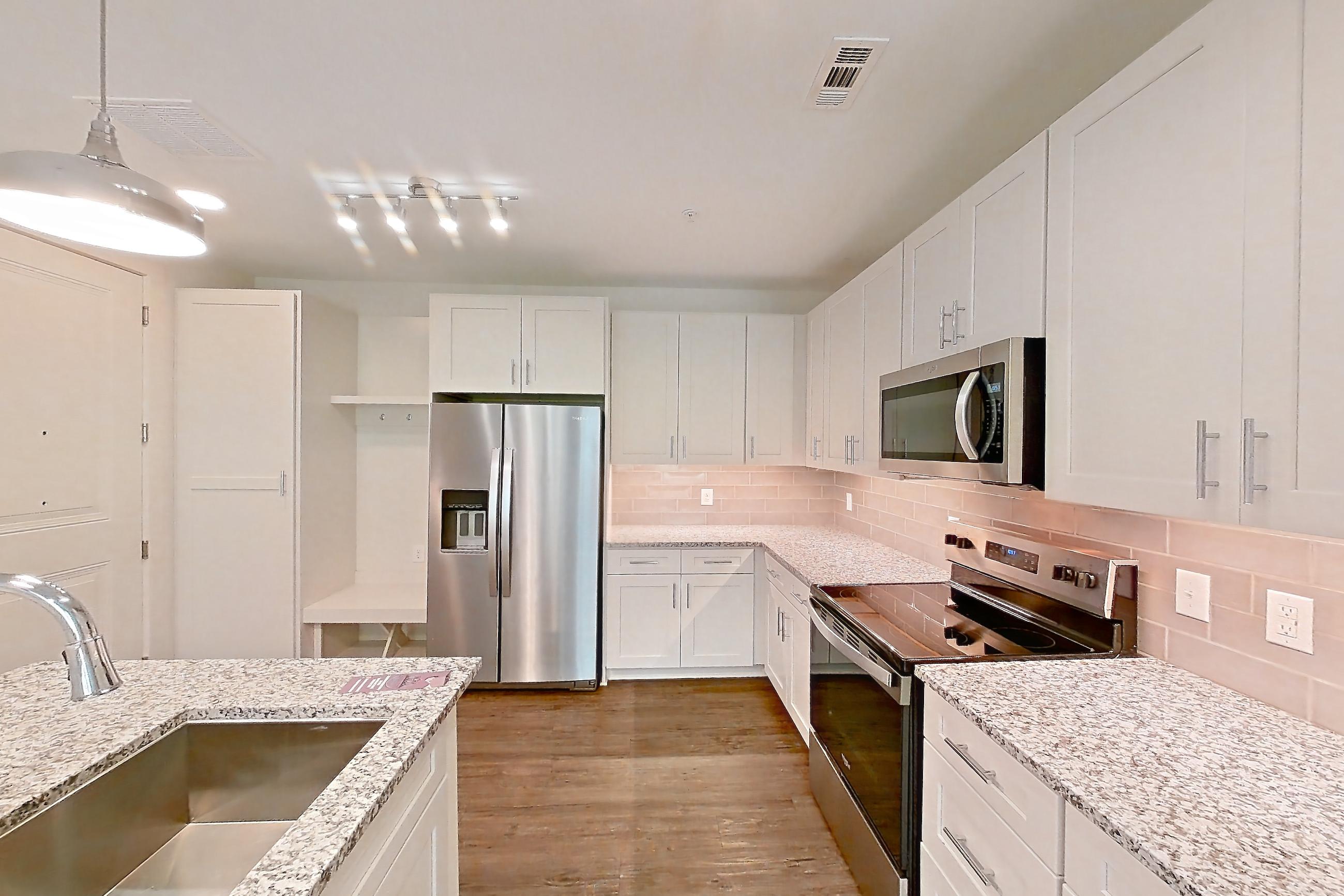 Kitchen in a A10 - Cobalt floor plan apartment, representative of Apartment 3-210 at Cortland Wren Northlake