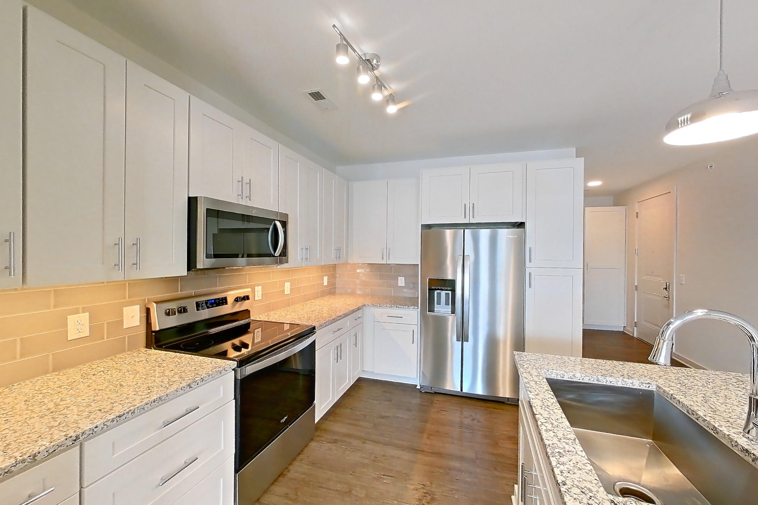 Kitchen in a B3 - Dodger floor plan apartment, representative of Apartment 4-212 at Cortland Wren Northlake
