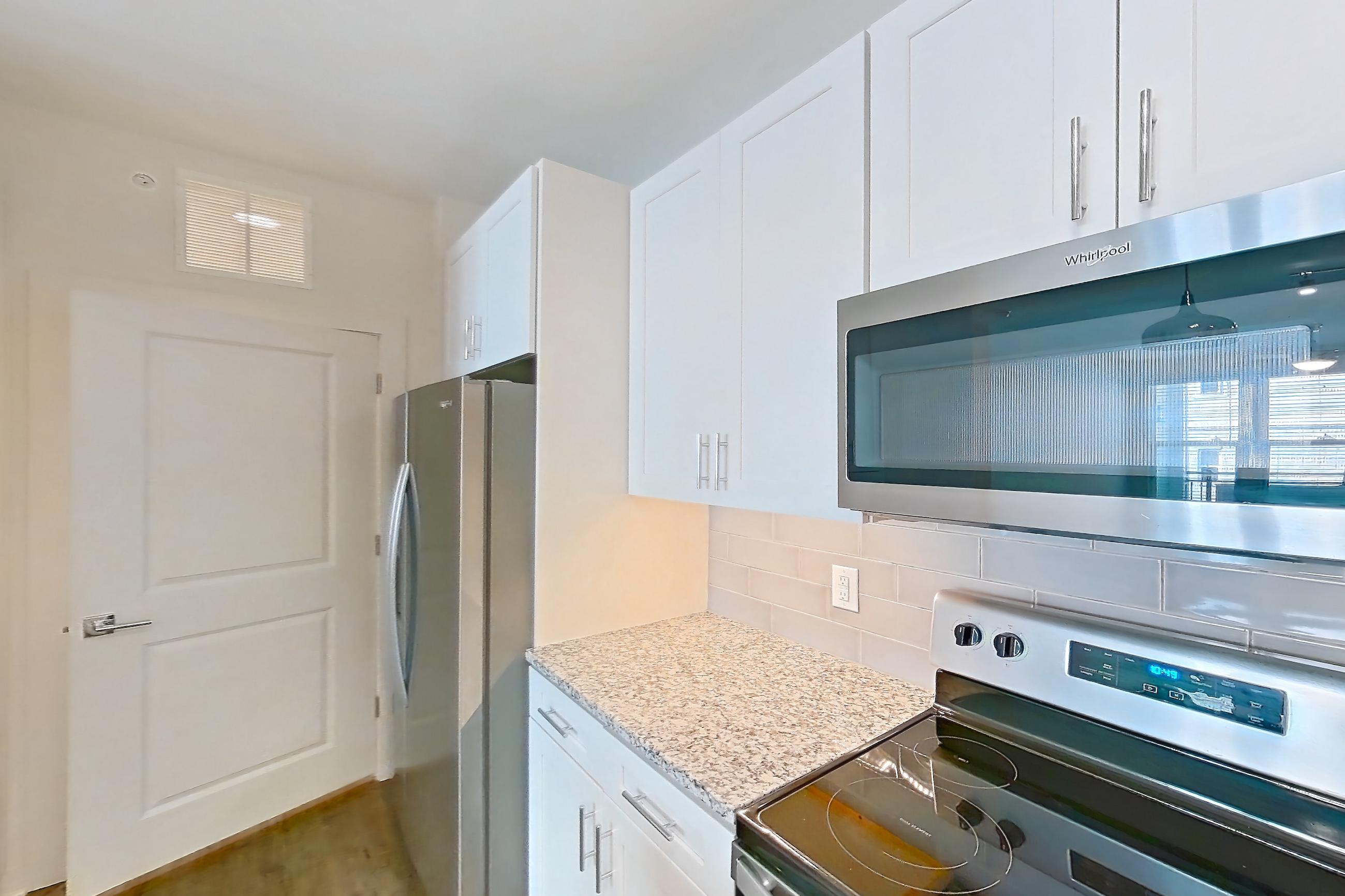 Kitchen in Apartment 4-209 at Cortland Wren Northlake, B2 - Deep Sky floor plan
