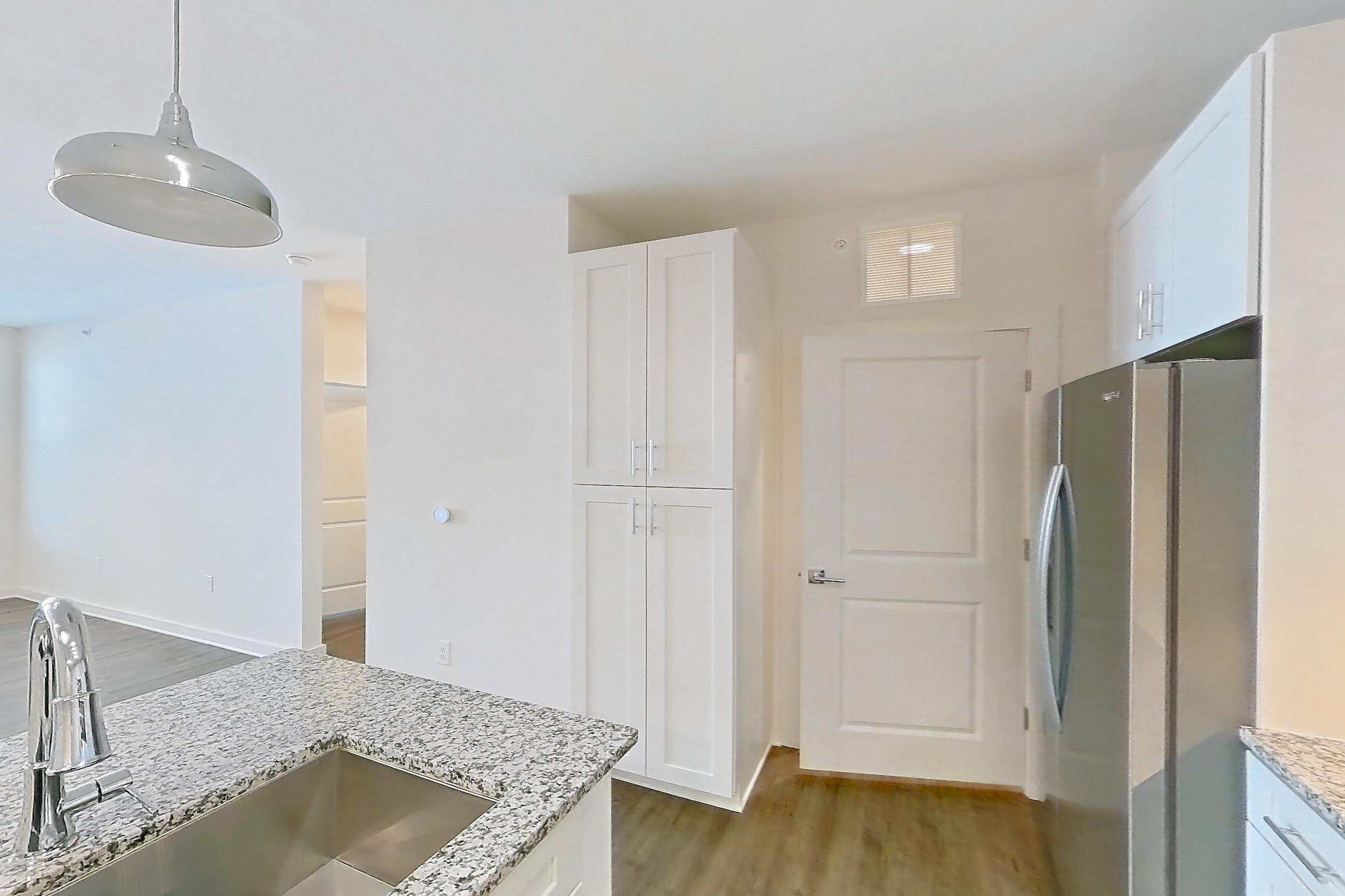 Kitchen in Apartment 4-209 at Cortland Wren Northlake, B2 - Deep Sky floor plan