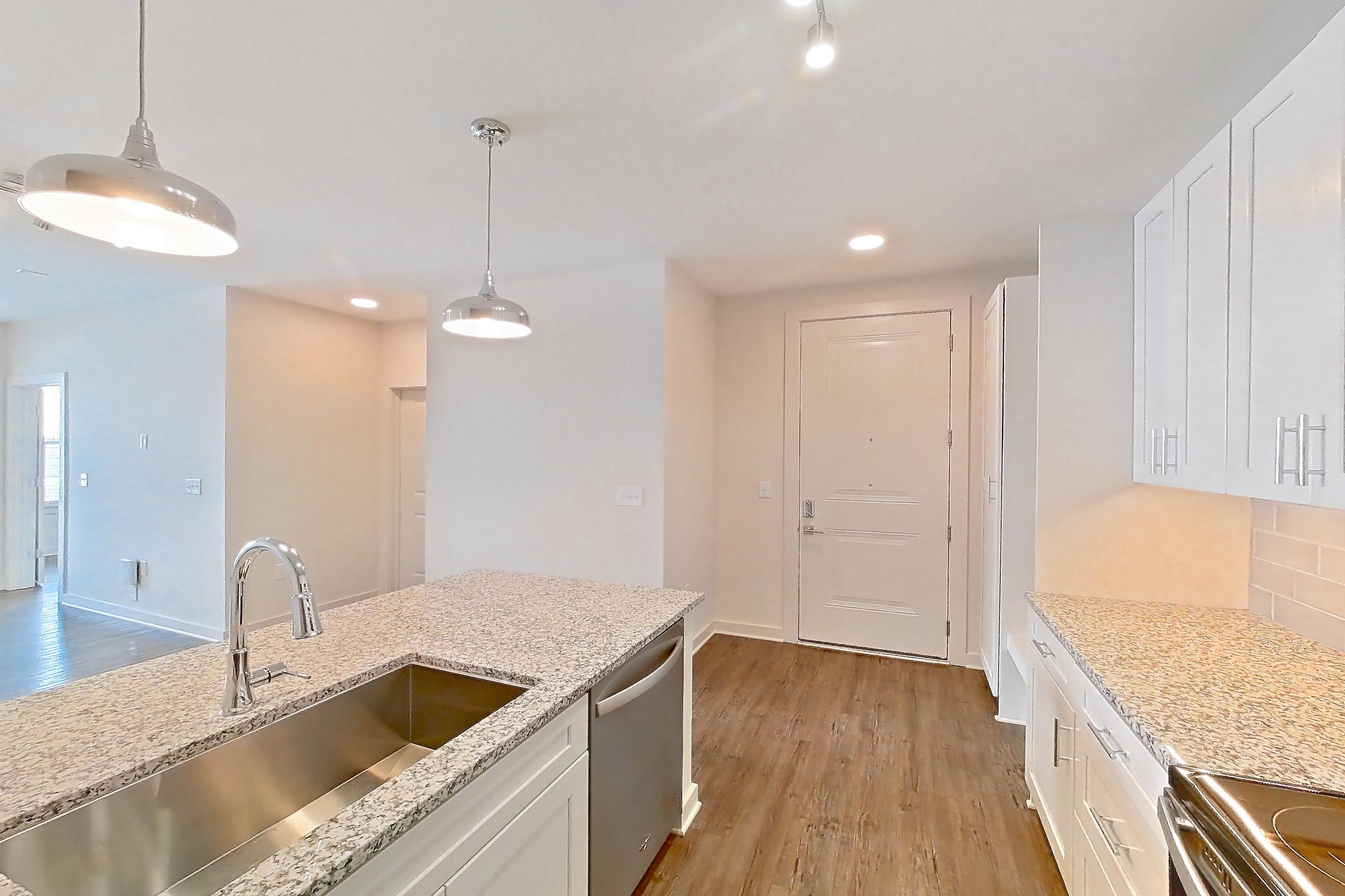 Kitchen in a B2 - Deep Sky floor plan apartment, representative of Apartment 2-109 at Cortland Wren Northlake
