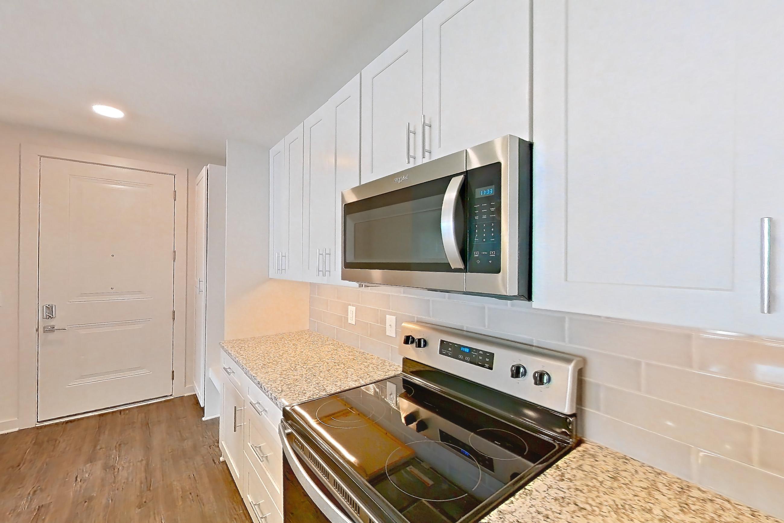Kitchen in a B2 - Deep Sky floor plan apartment, representative of Apartment 2-109 at Cortland Wren Northlake