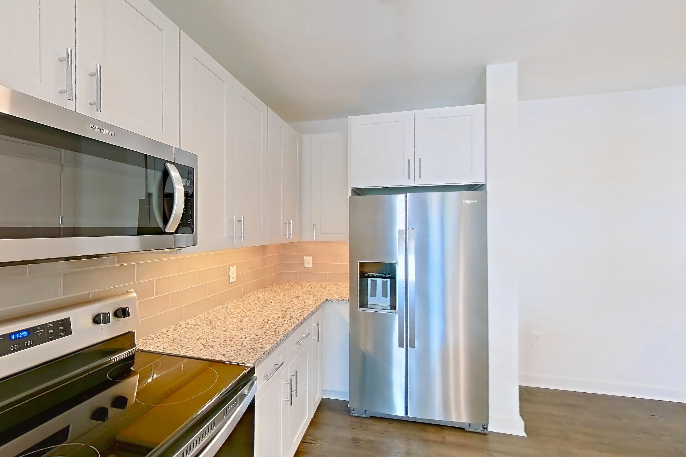 Kitchen in a A5 - Carolina floor plan apartment, representative of Apartment 2-105 at Cortland Wren Northlake