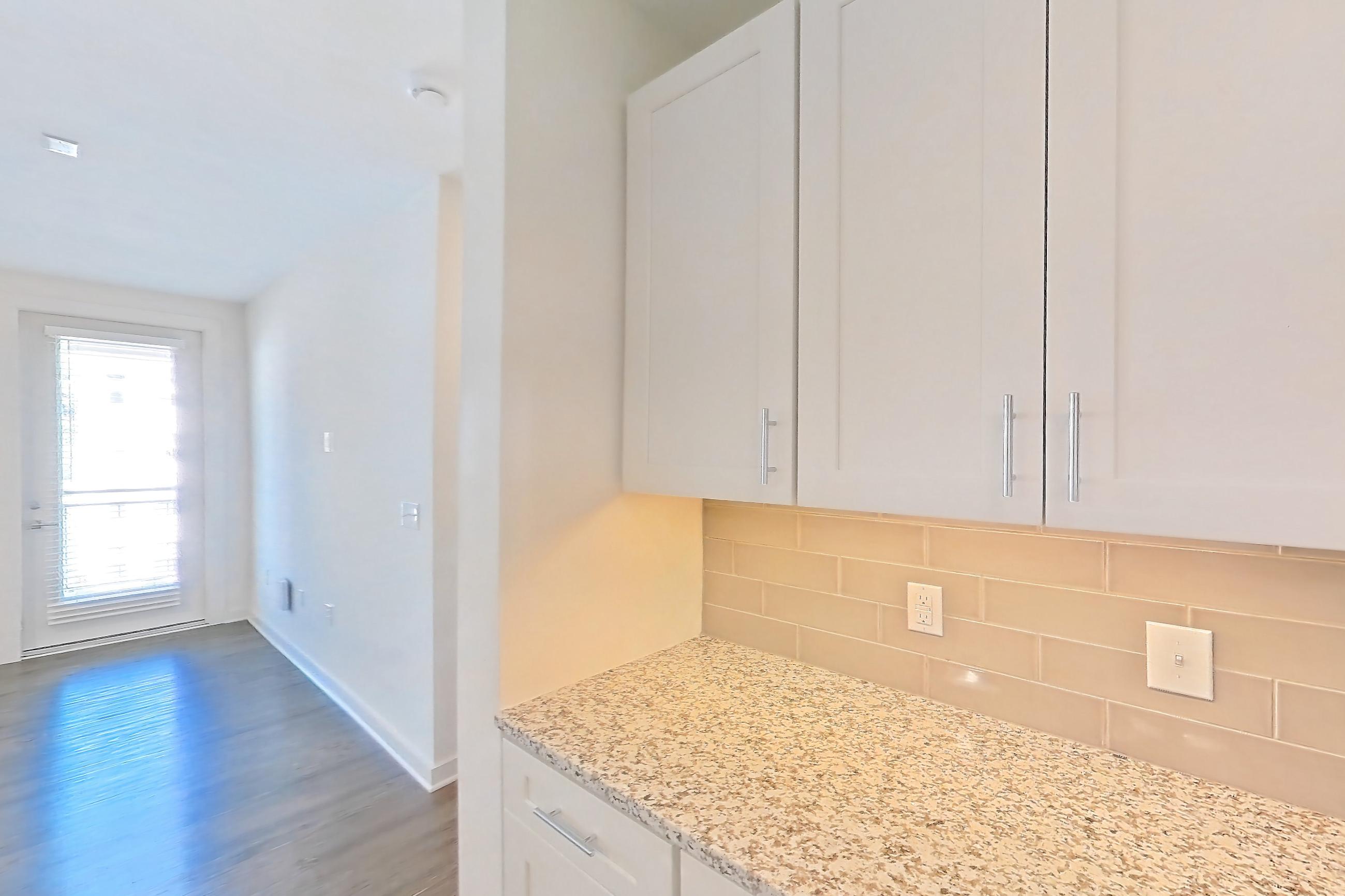 Kitchen in a A5 - Carolina floor plan apartment, representative of Apartment 2-105 at Cortland Wren Northlake