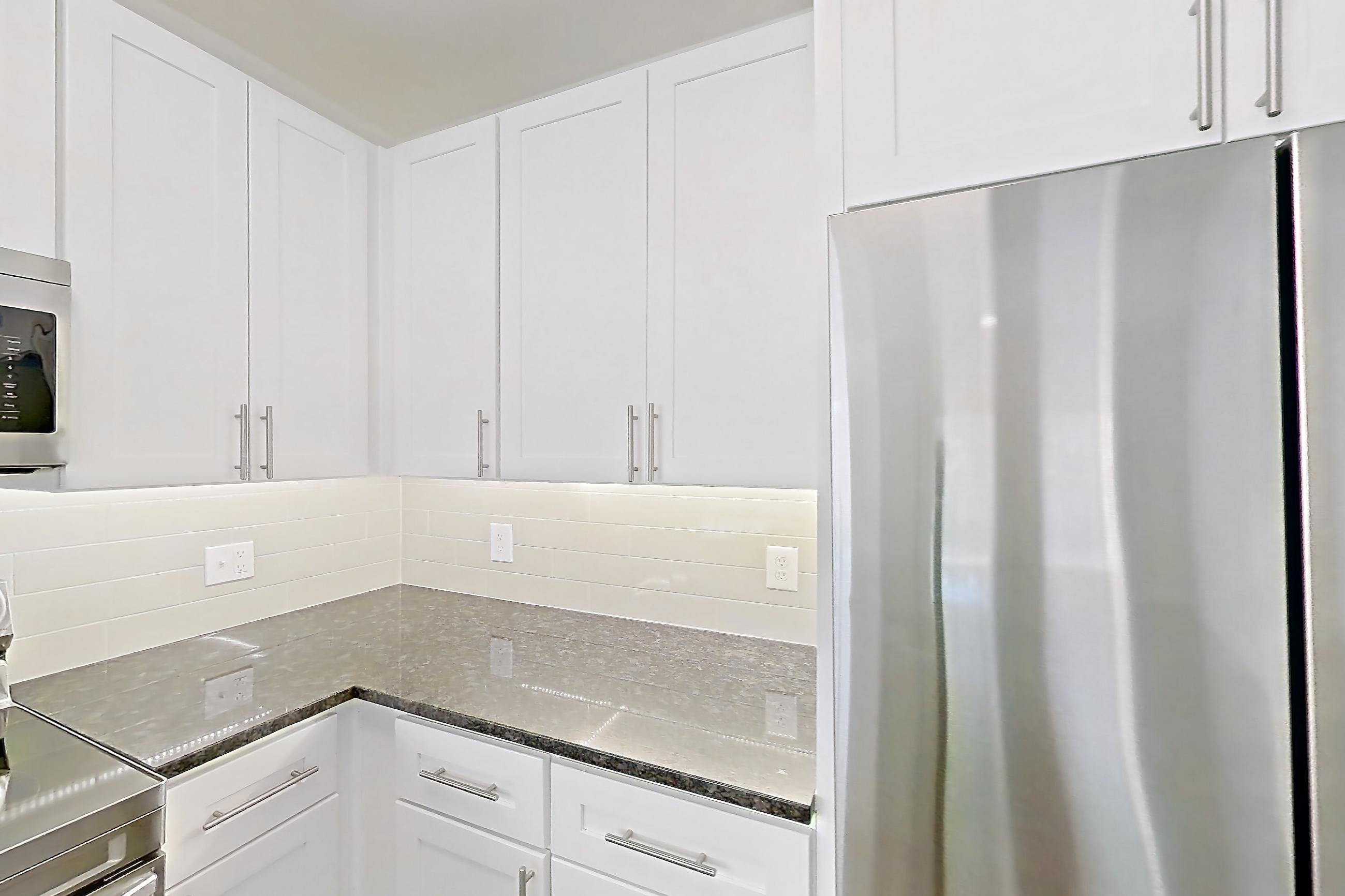 Kitchen in Apartment 00328 at Cortland West Plano, B9R - Colbert floor plan