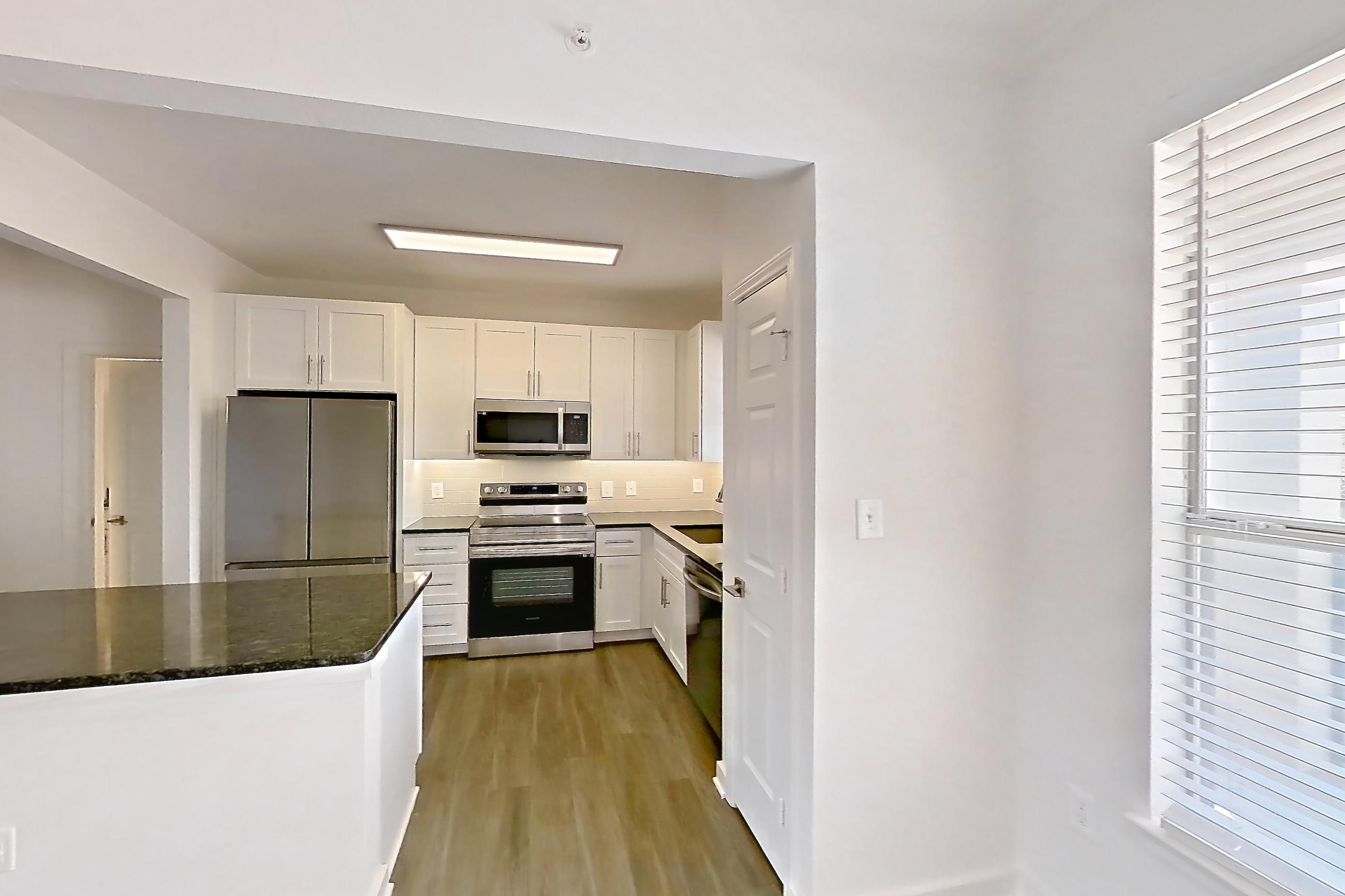 Dining room in Apartment 02933 at Cortland West Plano, A12R - Saddler floor plan