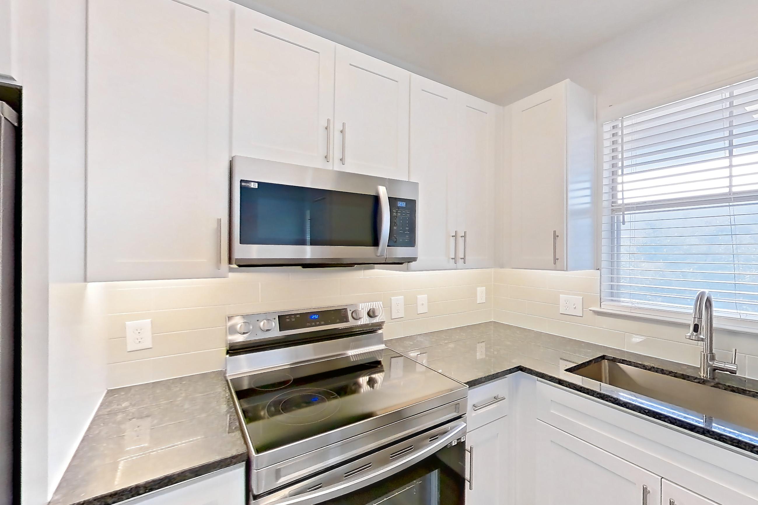 Kitchen in Apartment 02933 at Cortland West Plano, A12R - Saddler floor plan
