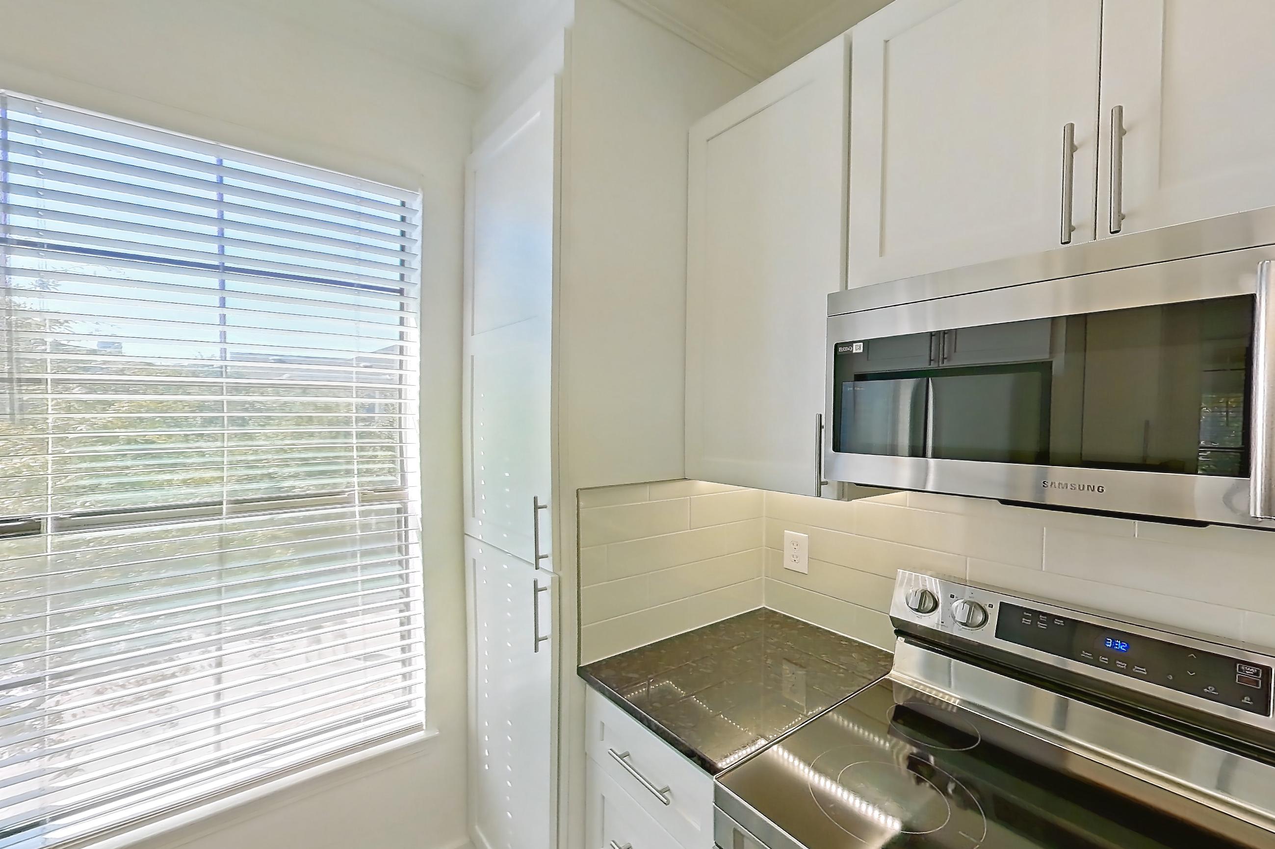 Kitchen in Apartment 07301 at Cortland West Plano, B4R - Paris floor plan