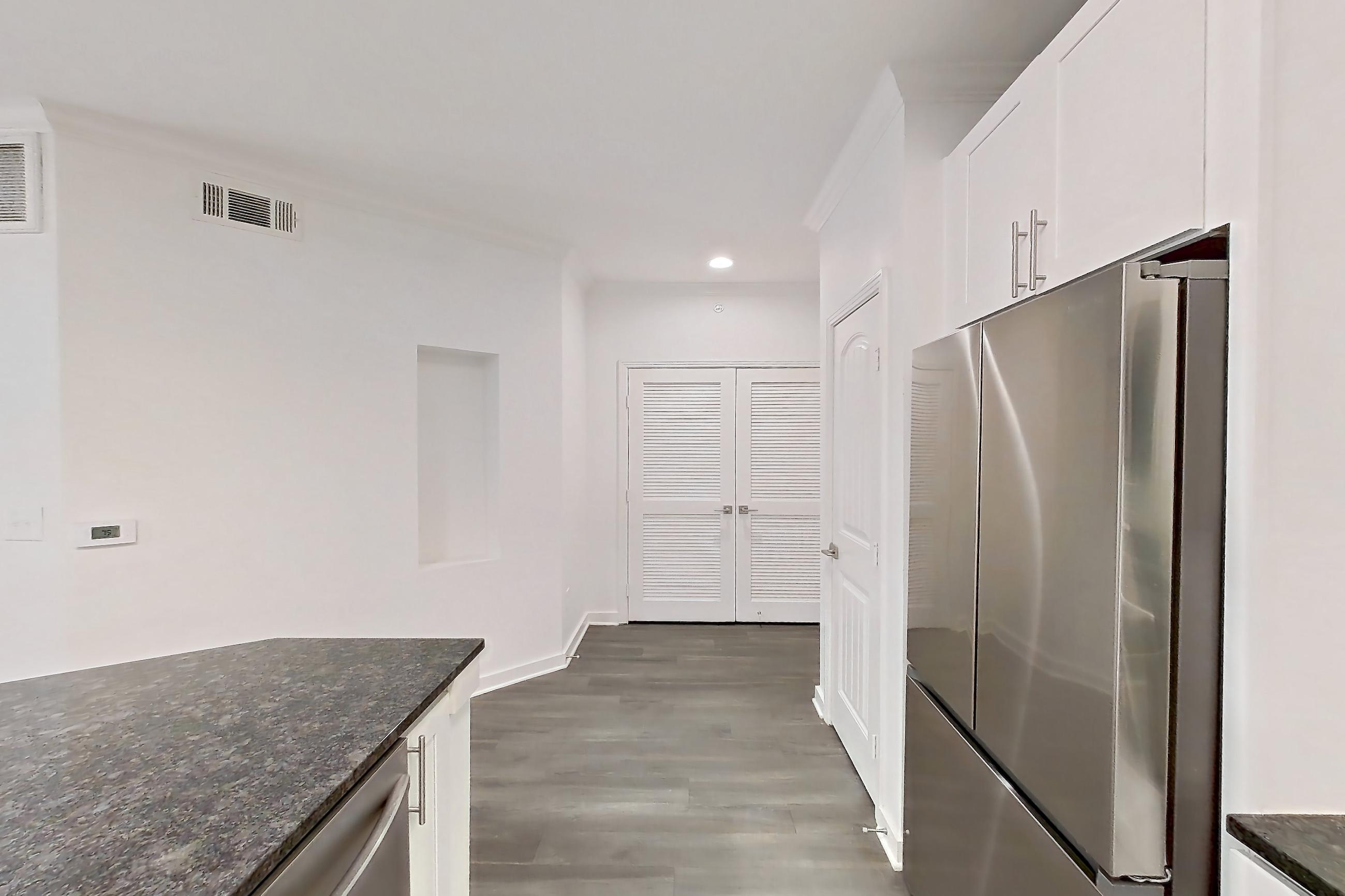 Kitchen in Apartment 11212 at Cortland West Plano, A1R - Cottage Hill floor plan