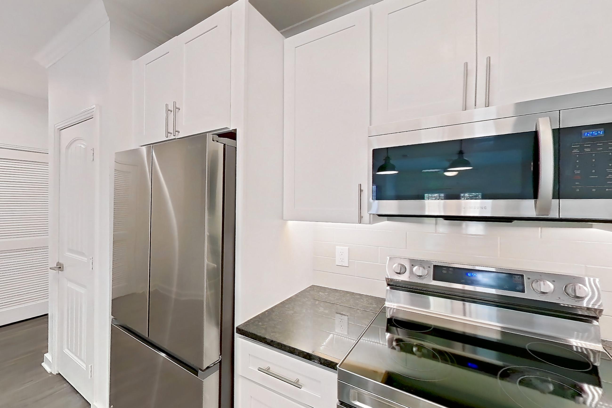 Kitchen in Apartment 11212 at Cortland West Plano, A1R - Cottage Hill floor plan