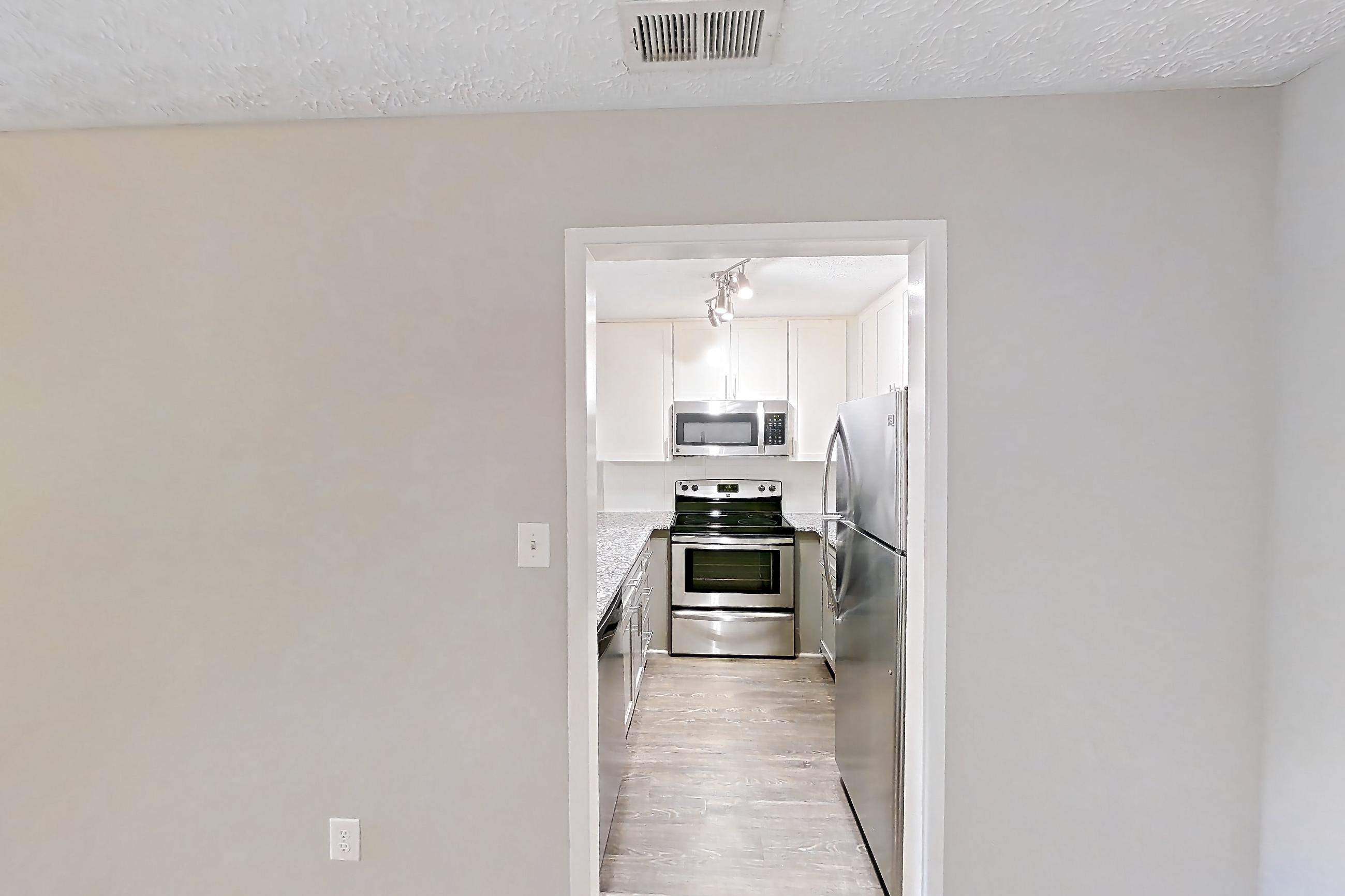 Dining room in Apartment 2039s at Cortland at the Village, B1aR - The Reece A floor plan