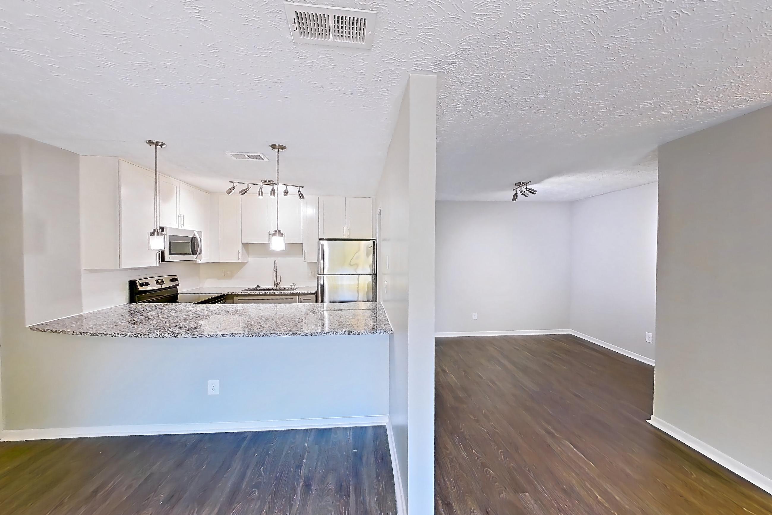 Living room in Apartment 2039s at Cortland at the Village, B1aR - The Reece A floor plan
