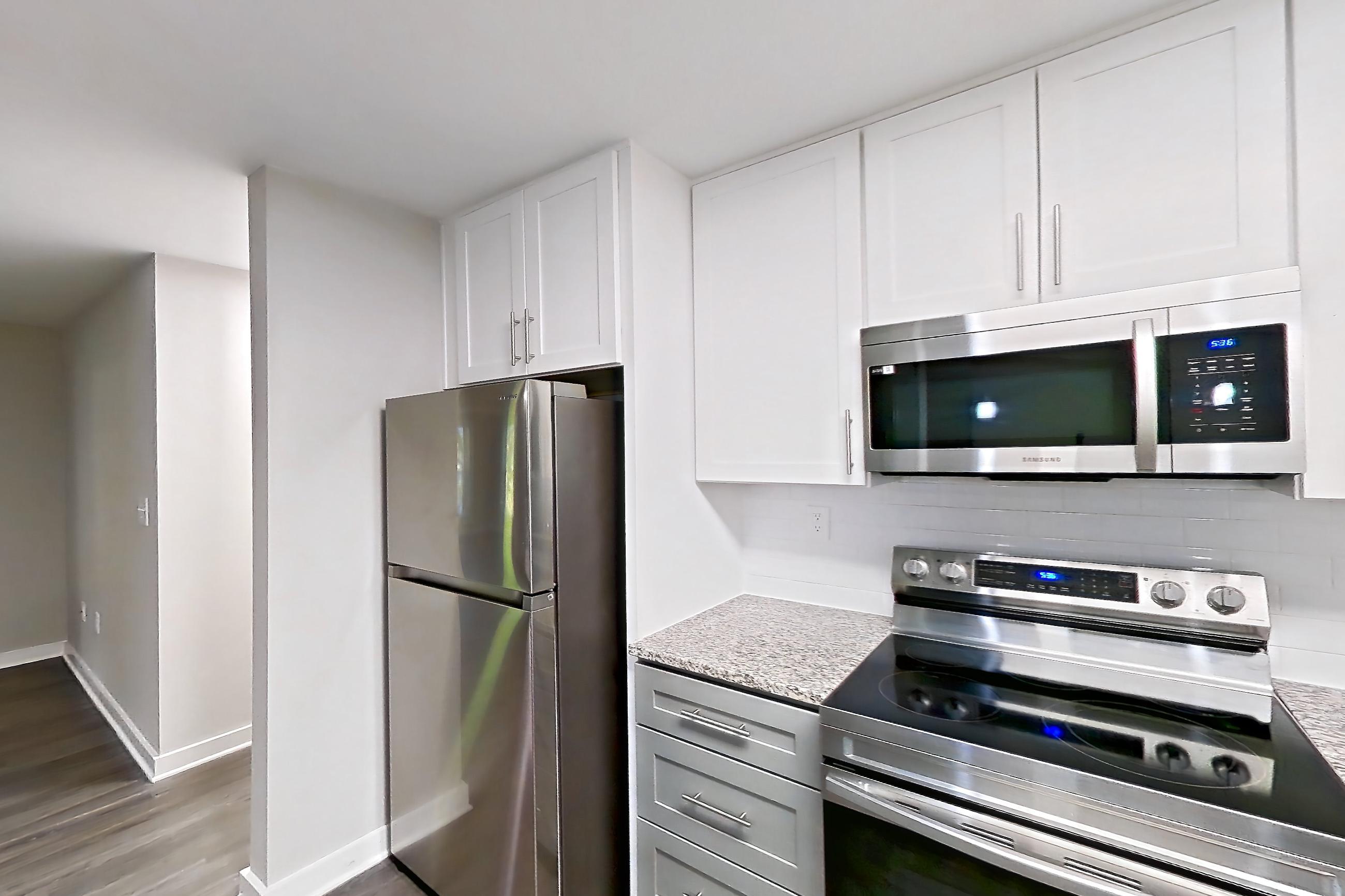 Kitchen in Apartment 2113d at Cortland at the Village, B2RR - The Johnson floor plan