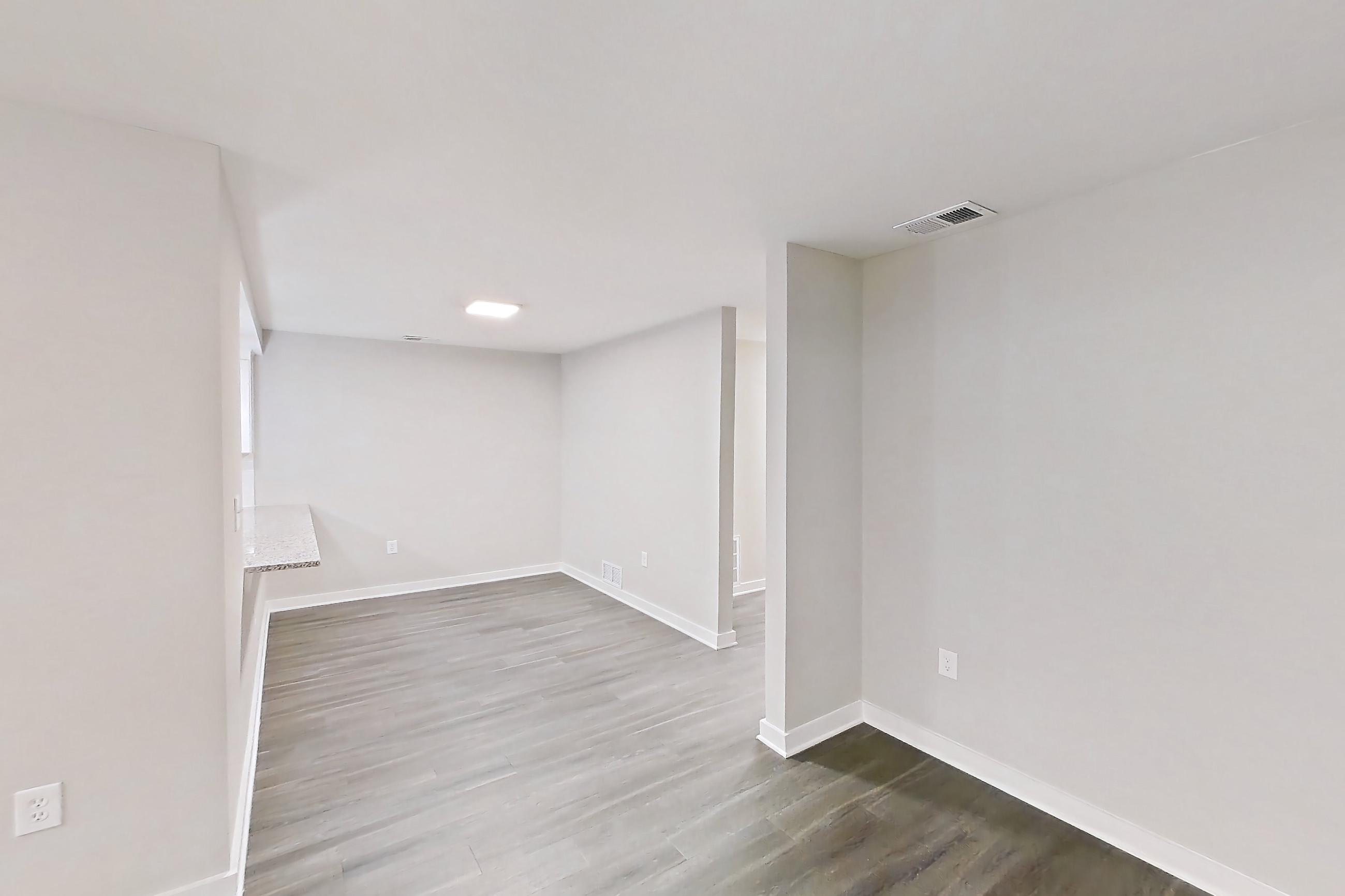 Living room in Apartment 2113d at Cortland at the Village, B2RR - The Johnson floor plan