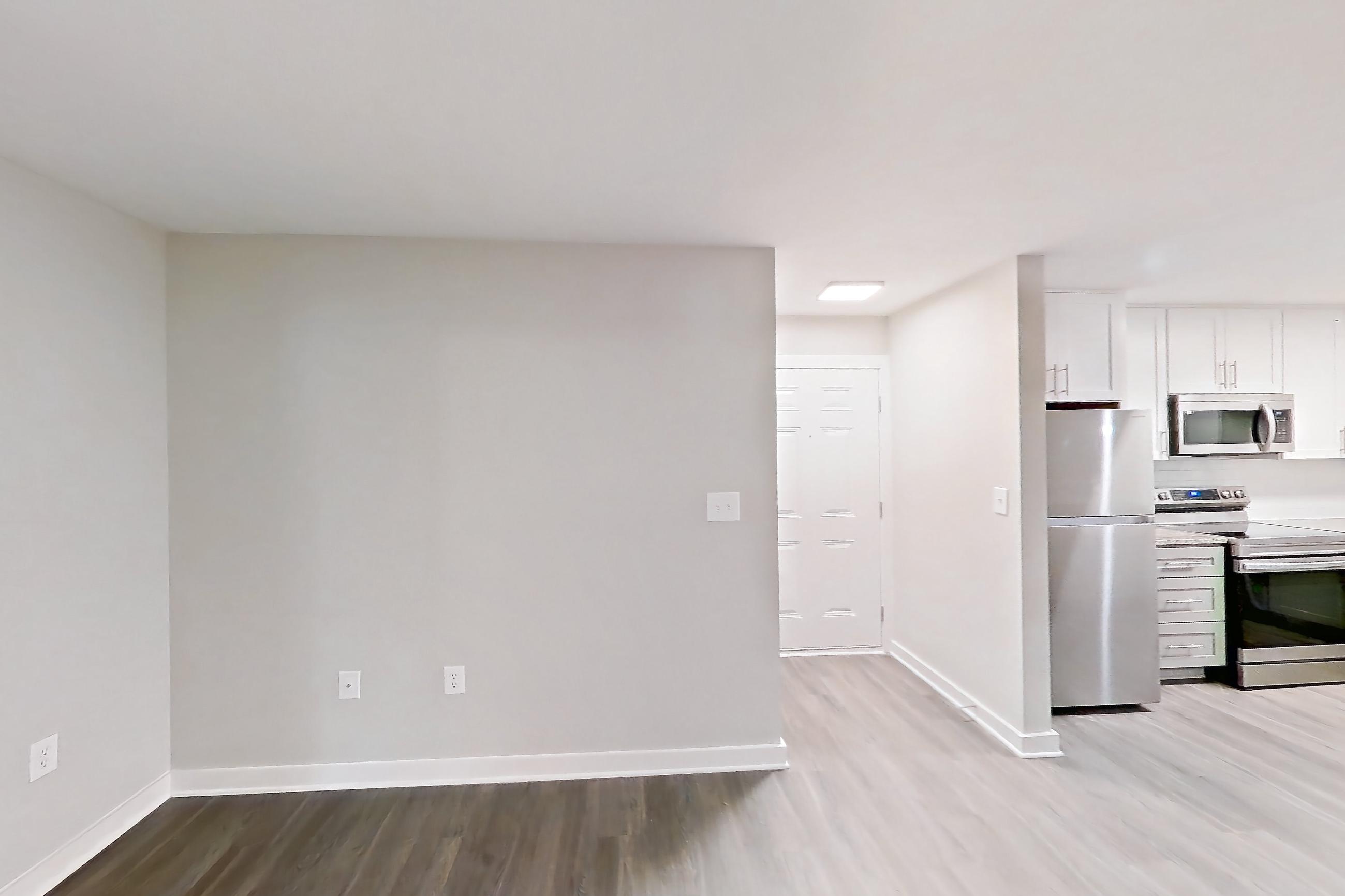 Living room in Apartment 2113d at Cortland at the Village, B2RR - The Johnson floor plan