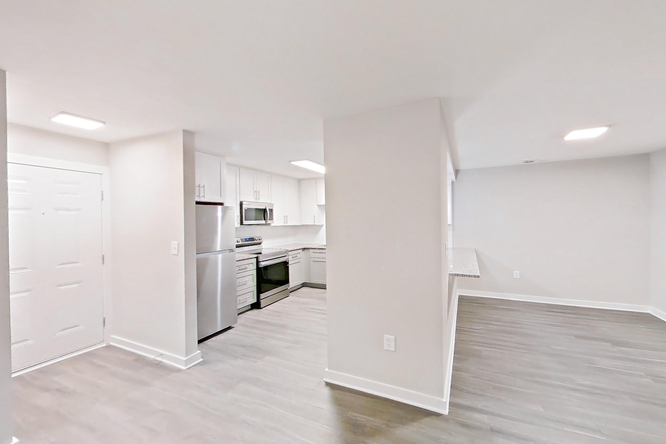 Living room in Apartment 2113d at Cortland at the Village, B2RR - The Johnson floor plan
