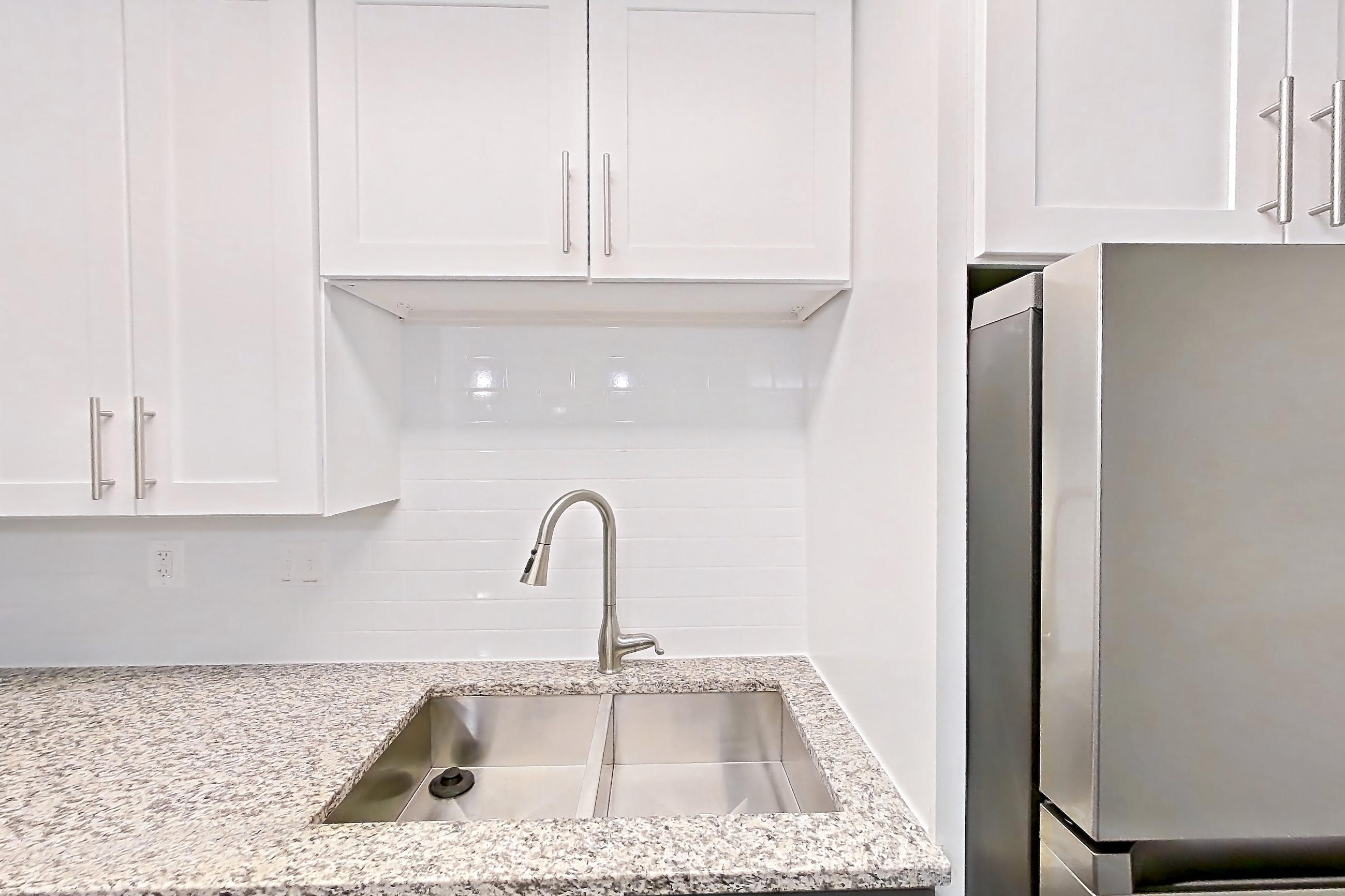 Kitchen in Apartment 2125s at Cortland at the Village, A2RR - The McClay A floor plan