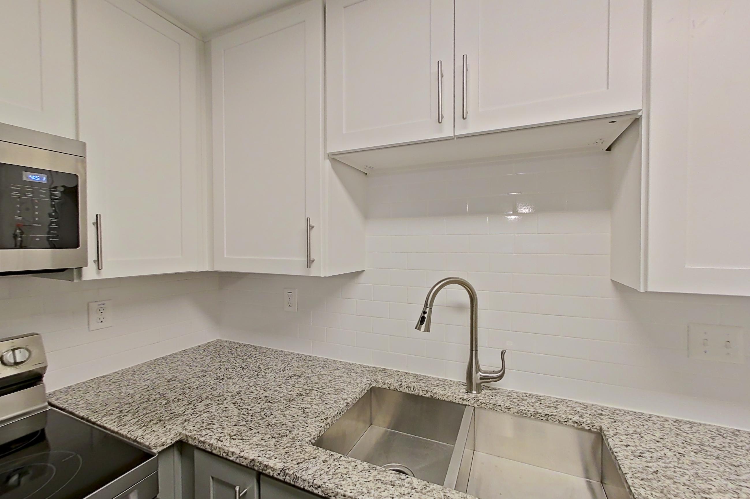 Kitchen in Apartment 2137i at Cortland at the Village, A3RR - The Adair floor plan