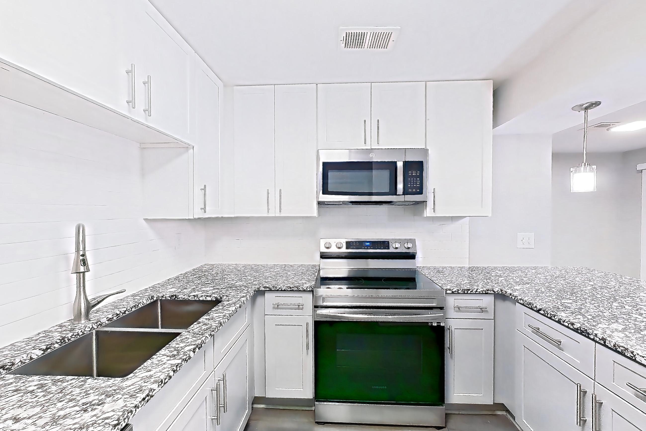 Kitchen in Apartment 2139b at Cortland at the Village, A5RR - The Griffin floor plan