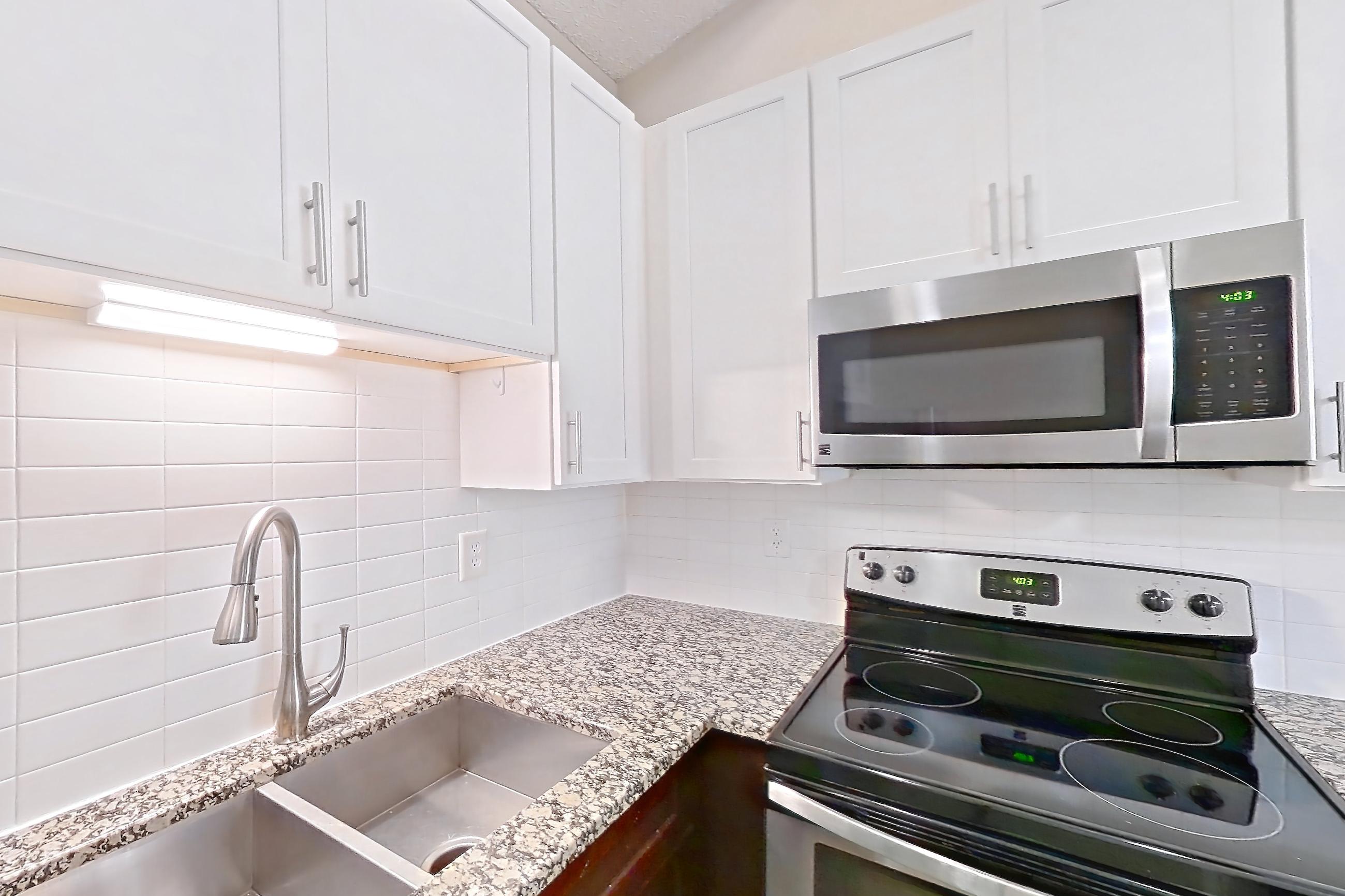 Kitchen in Apartment 2175r at Cortland at the Village, A2aR - The McClay A floor plan