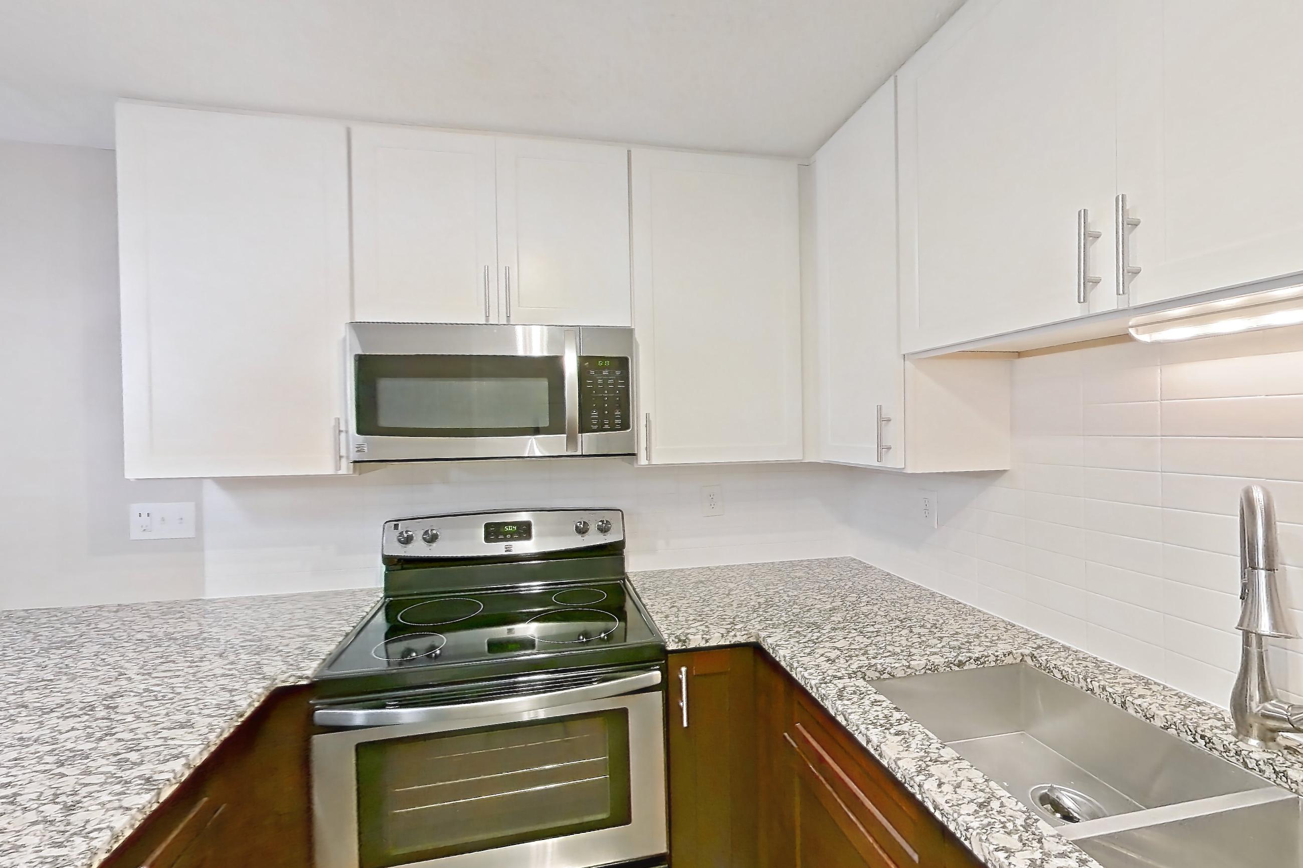 Kitchen in Apartment 2179e at Cortland at the Village, A5aR - The Griffin A floor plan