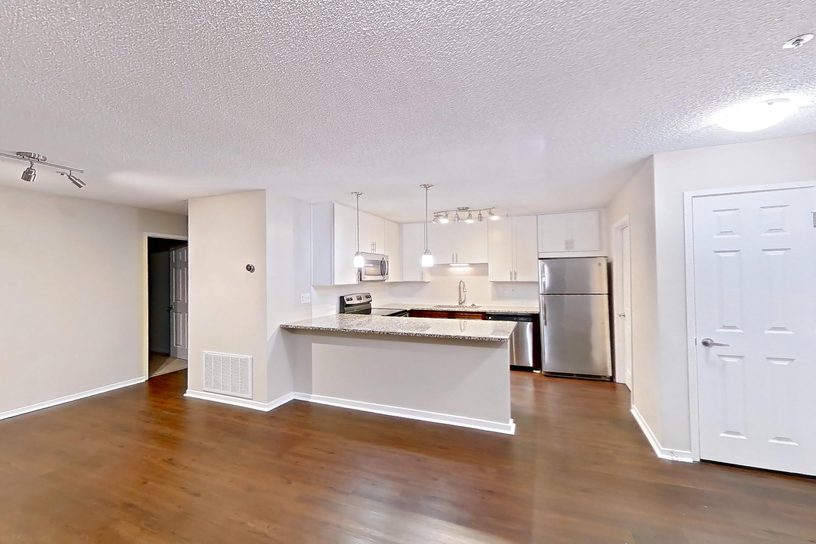 Living room in Apartment 2179e at Cortland at the Village, A5aR - The Griffin A floor plan